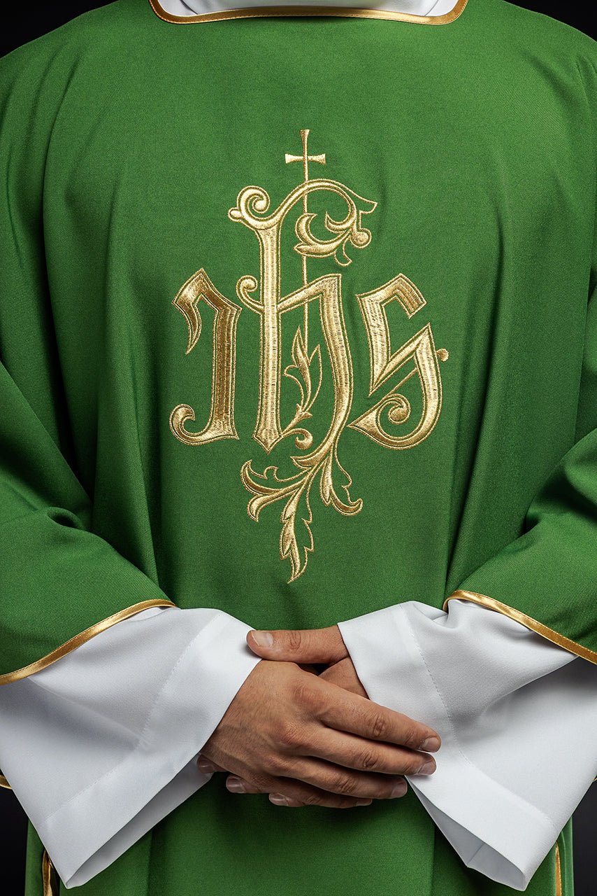 Green dalmatic close-up showing gold IHS embroidery and gold trim
