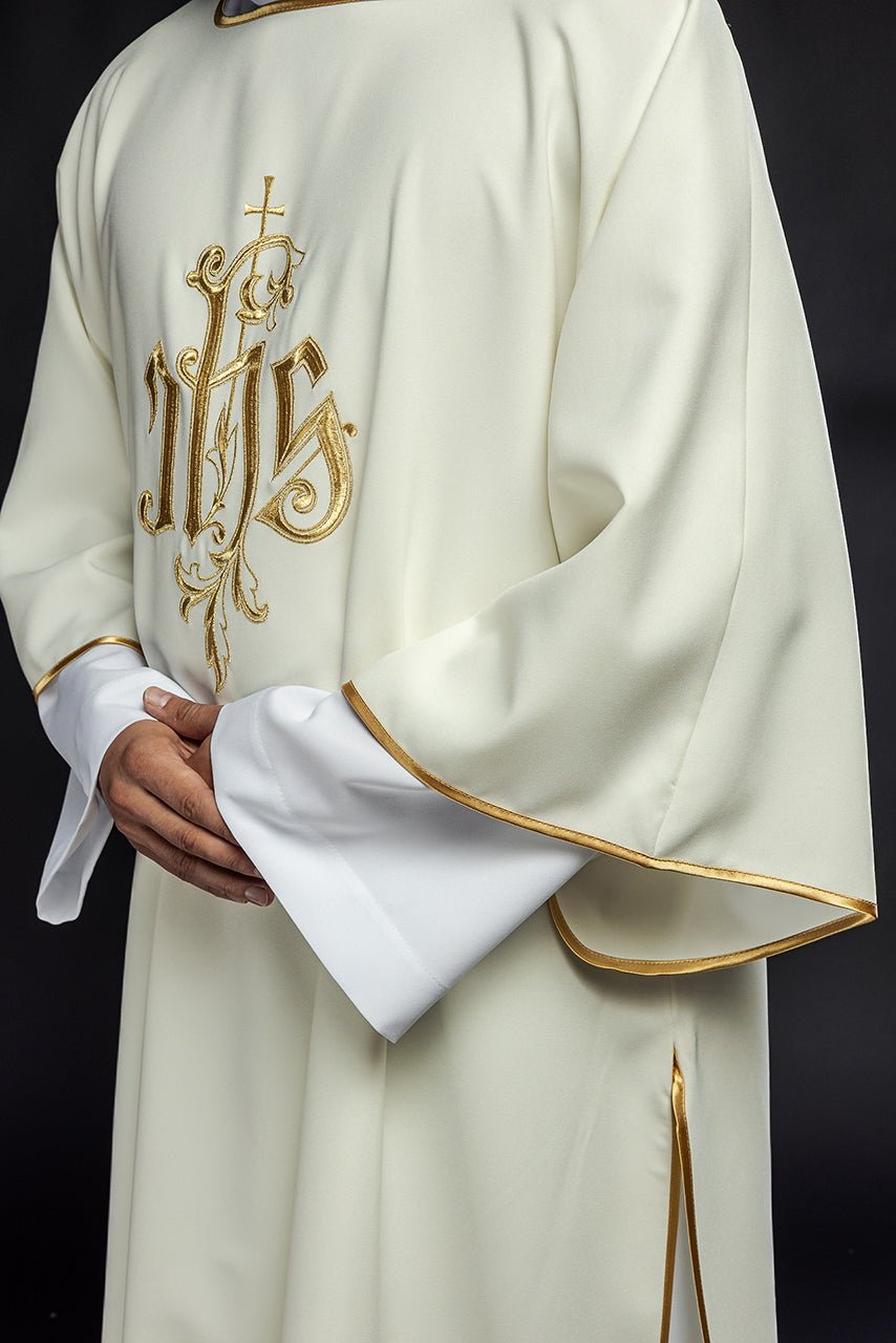Ecru dalmatic side view with gold trim on the sleeve and hem