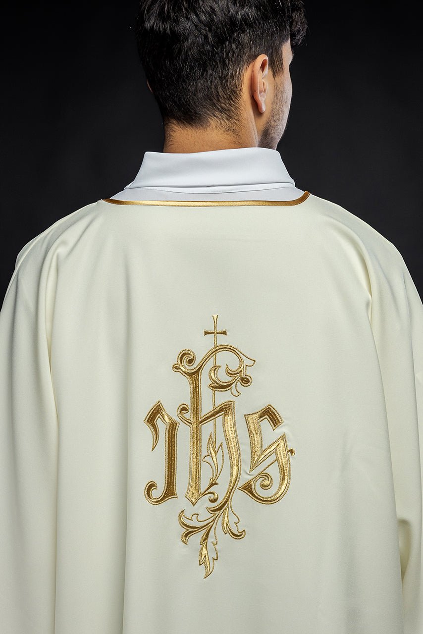 Ecru dalmatic back view with gold IHS embroidery and neckline trim