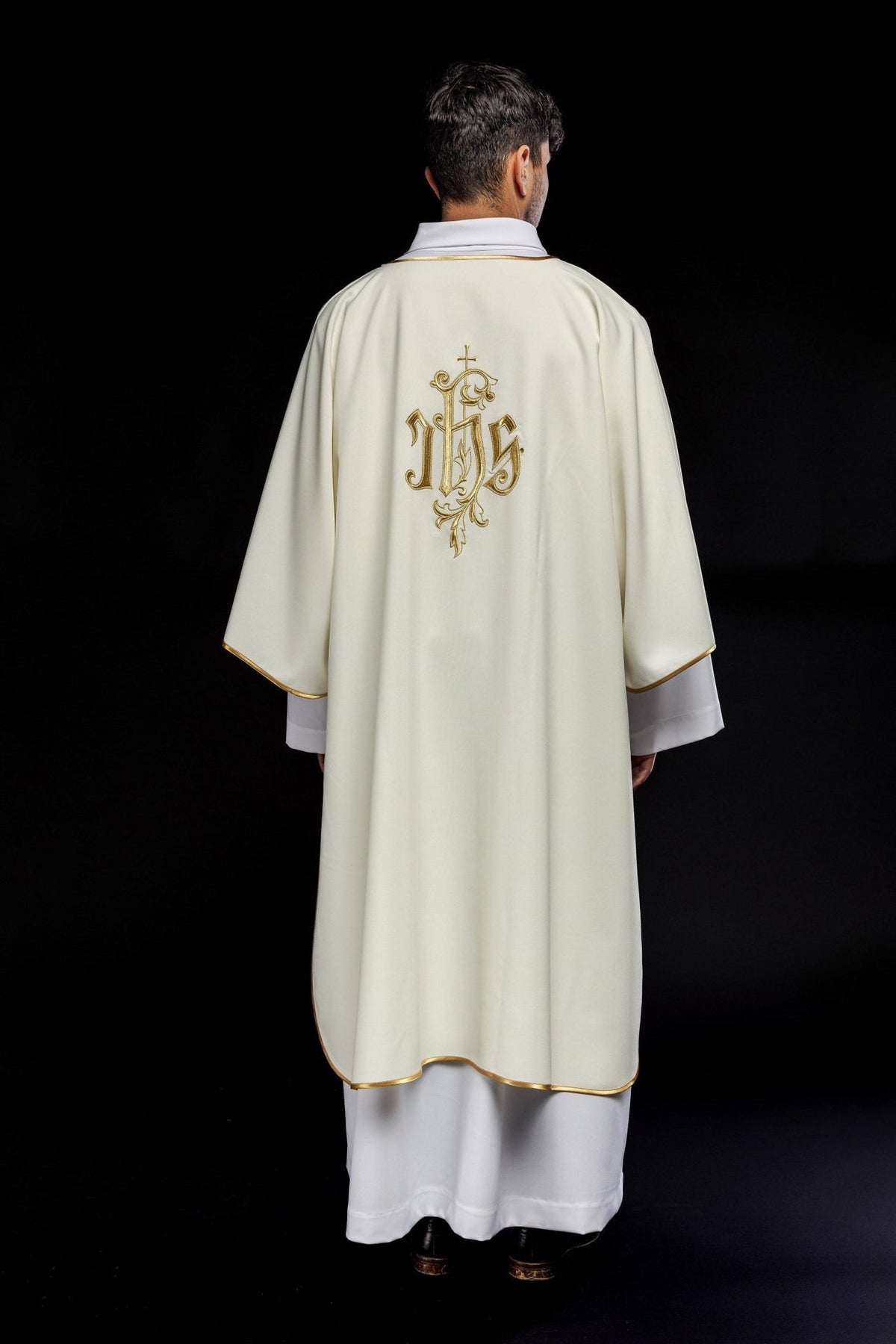 Ecru dalmatic full back view with gold embroidery and trim