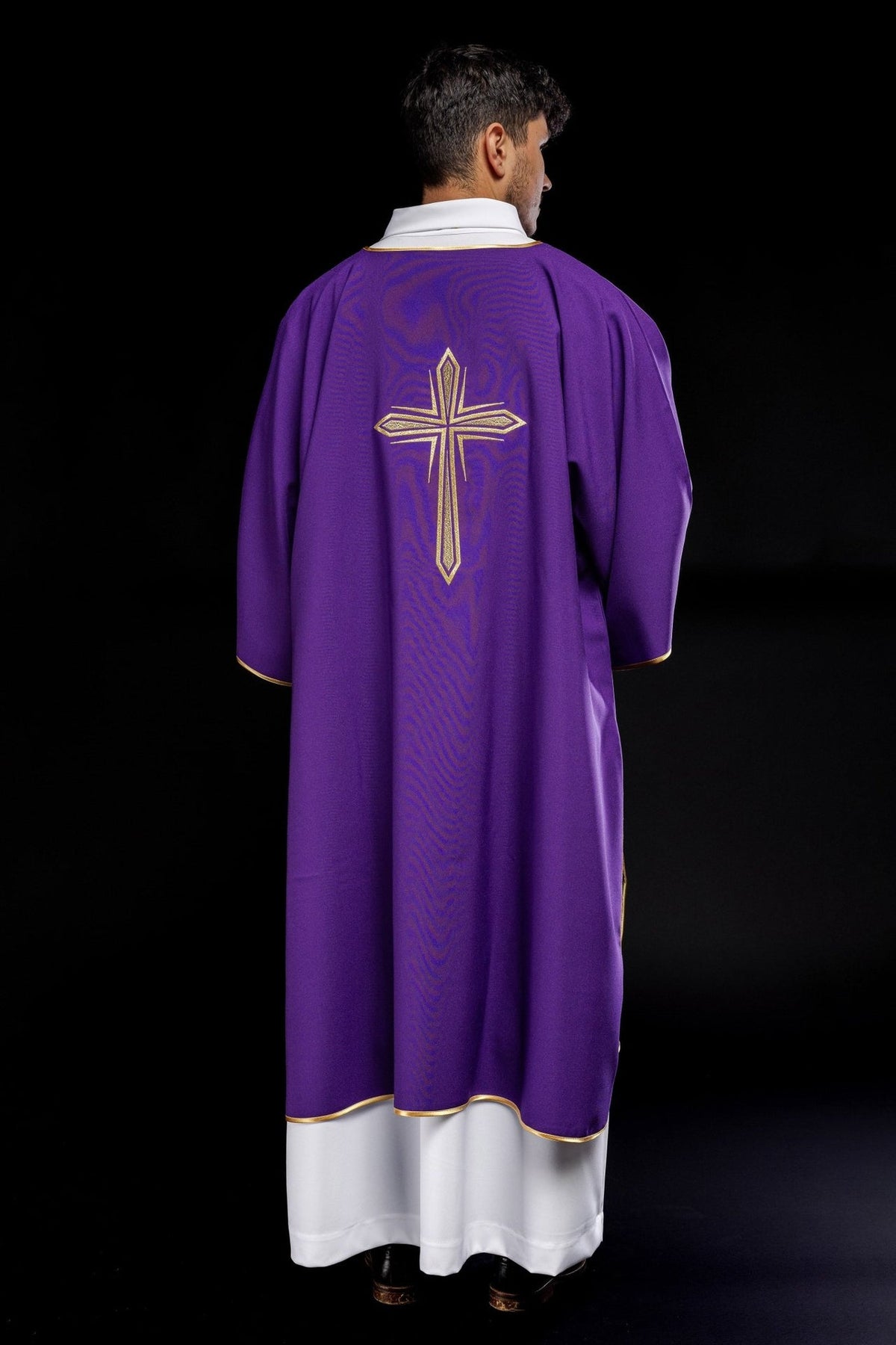 Purple dalmatic, back view with embroidered gold cross and gold trim