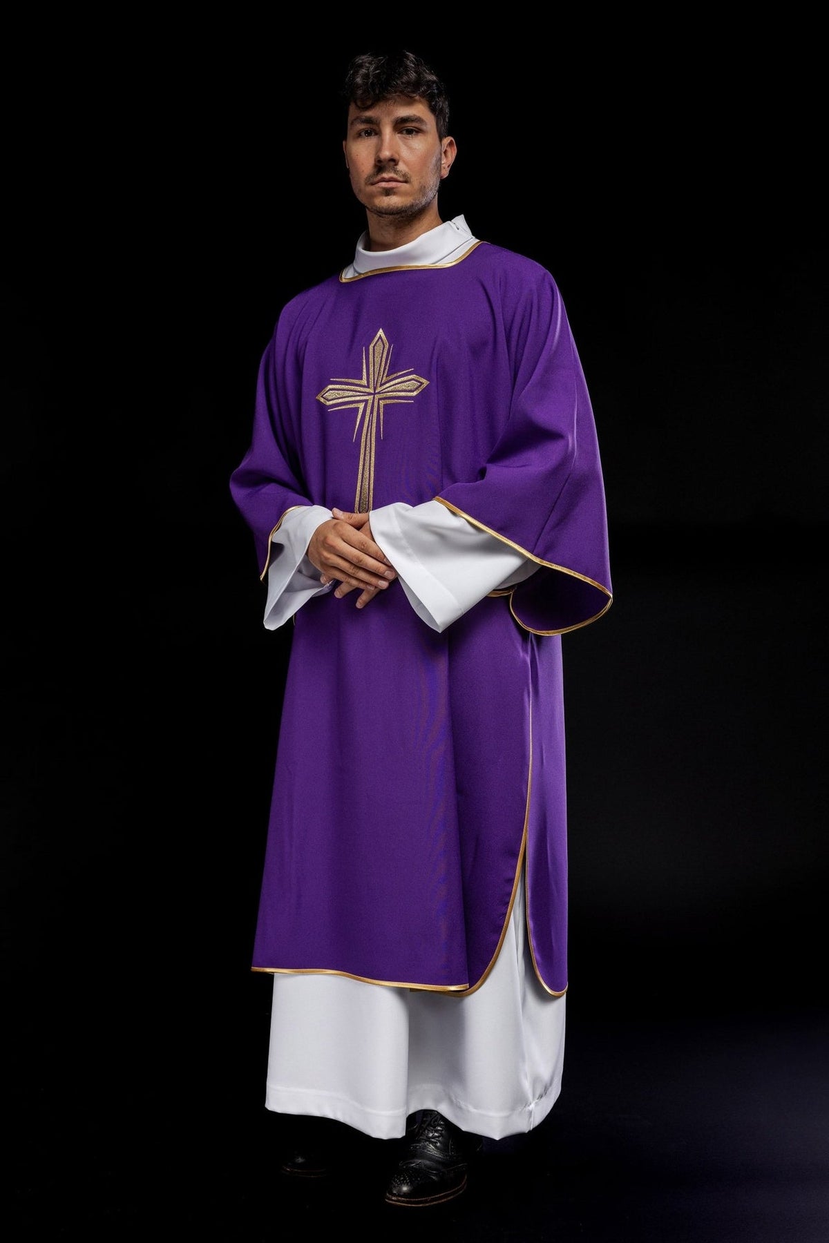 Purple dalmatic, angled front view with embroidered gold cross and gold trim