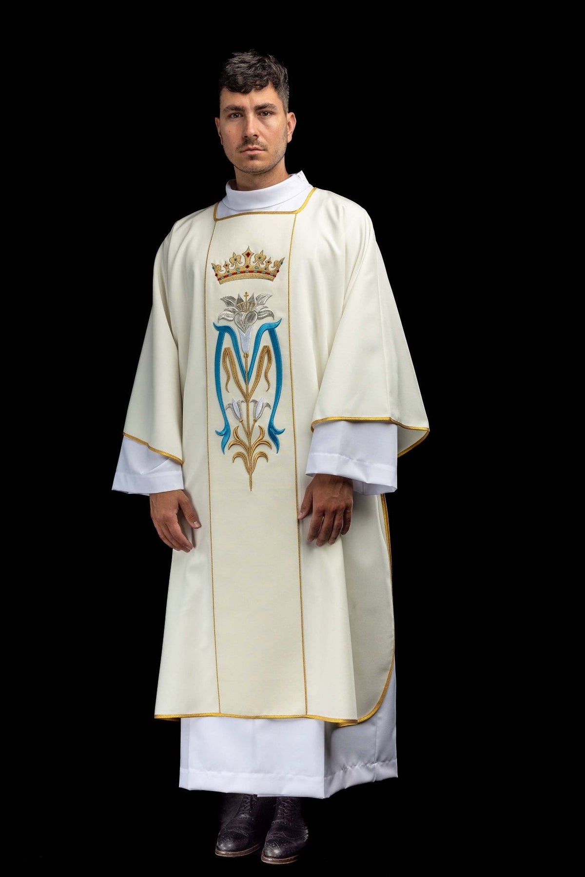 Ecru dalmatic, full front view with embroidered Marian symbol and gold trim
