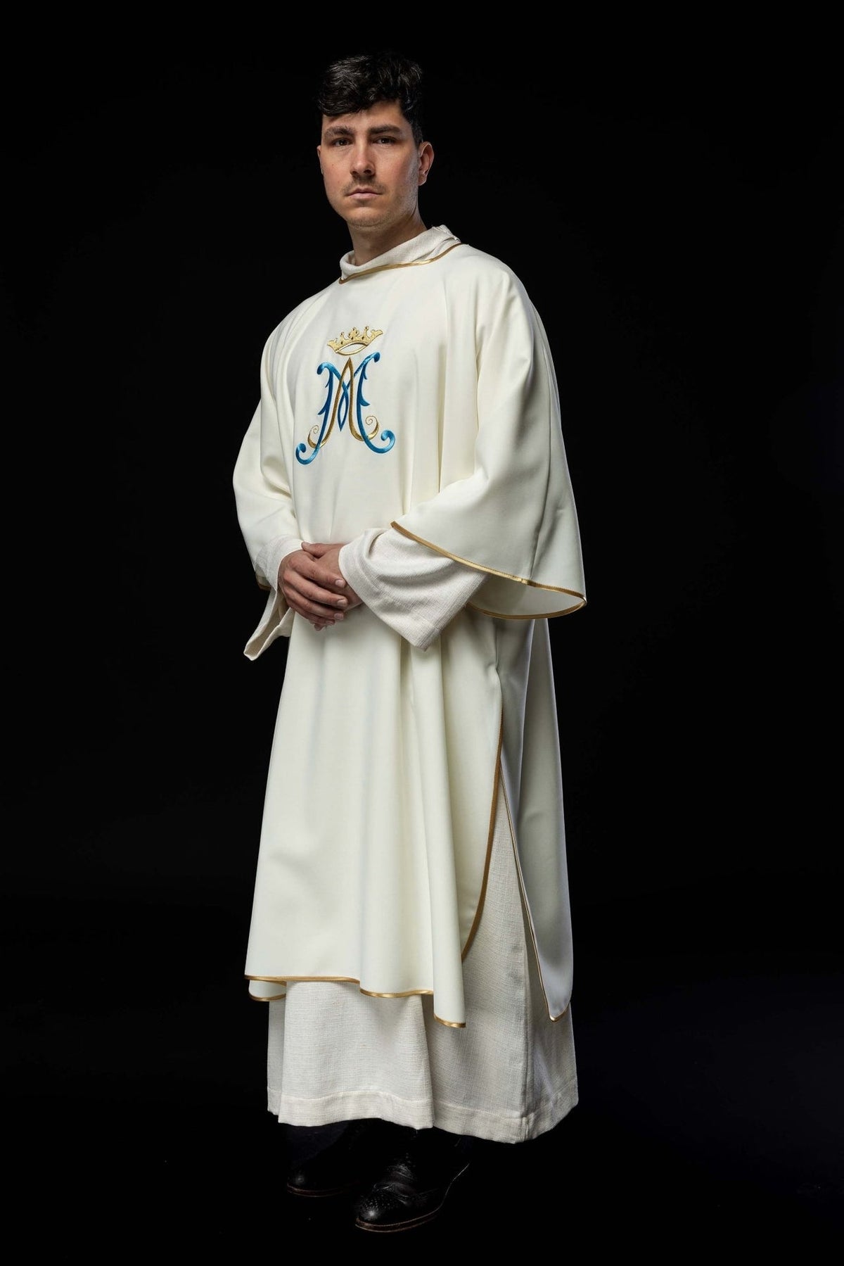 Ecru dalmatic, three-quarter front view with Marian embroidery and gold trim