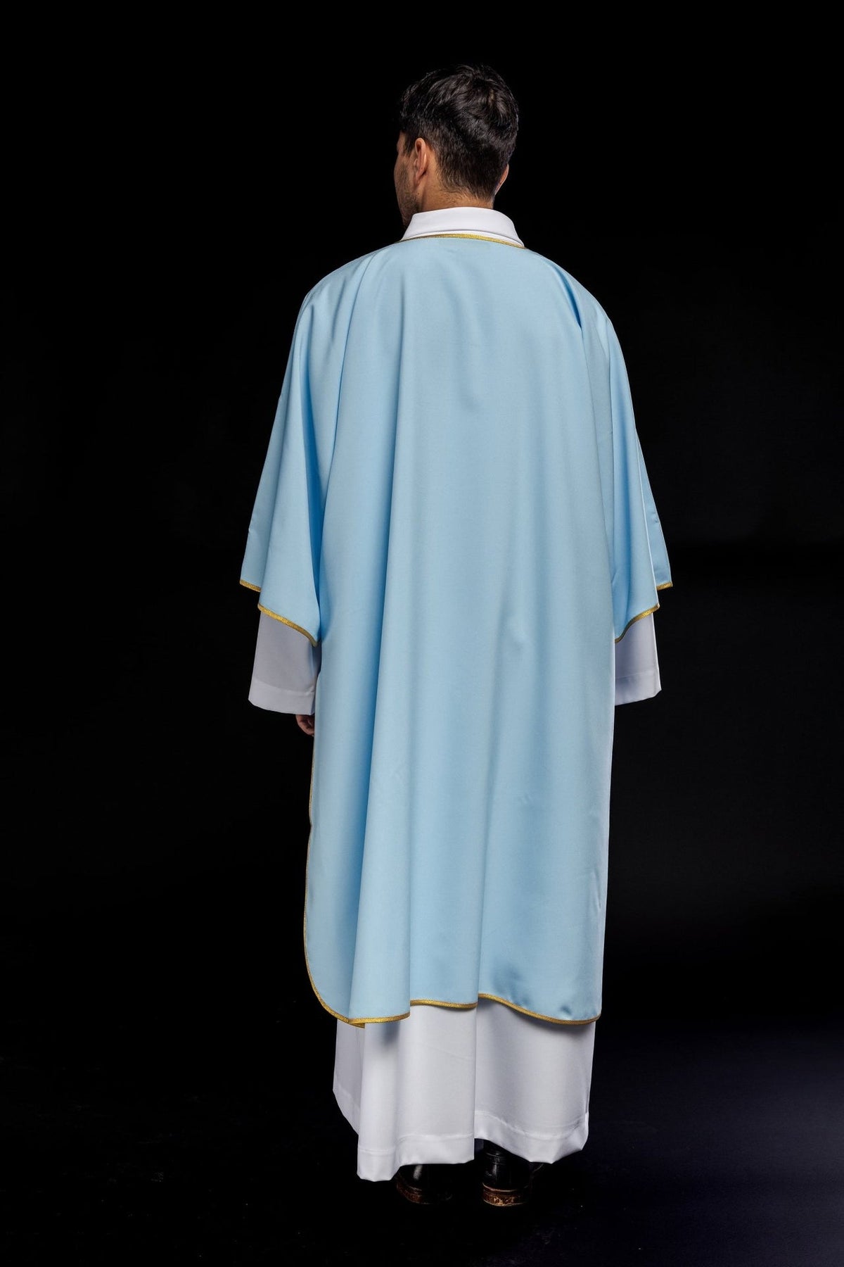 Blue dalmatic, back view with gold-trimmed edges