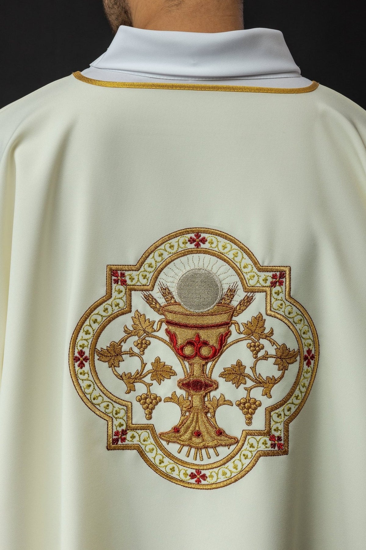 Dalmatic back view with Communion Chalice embroidery and gold trim