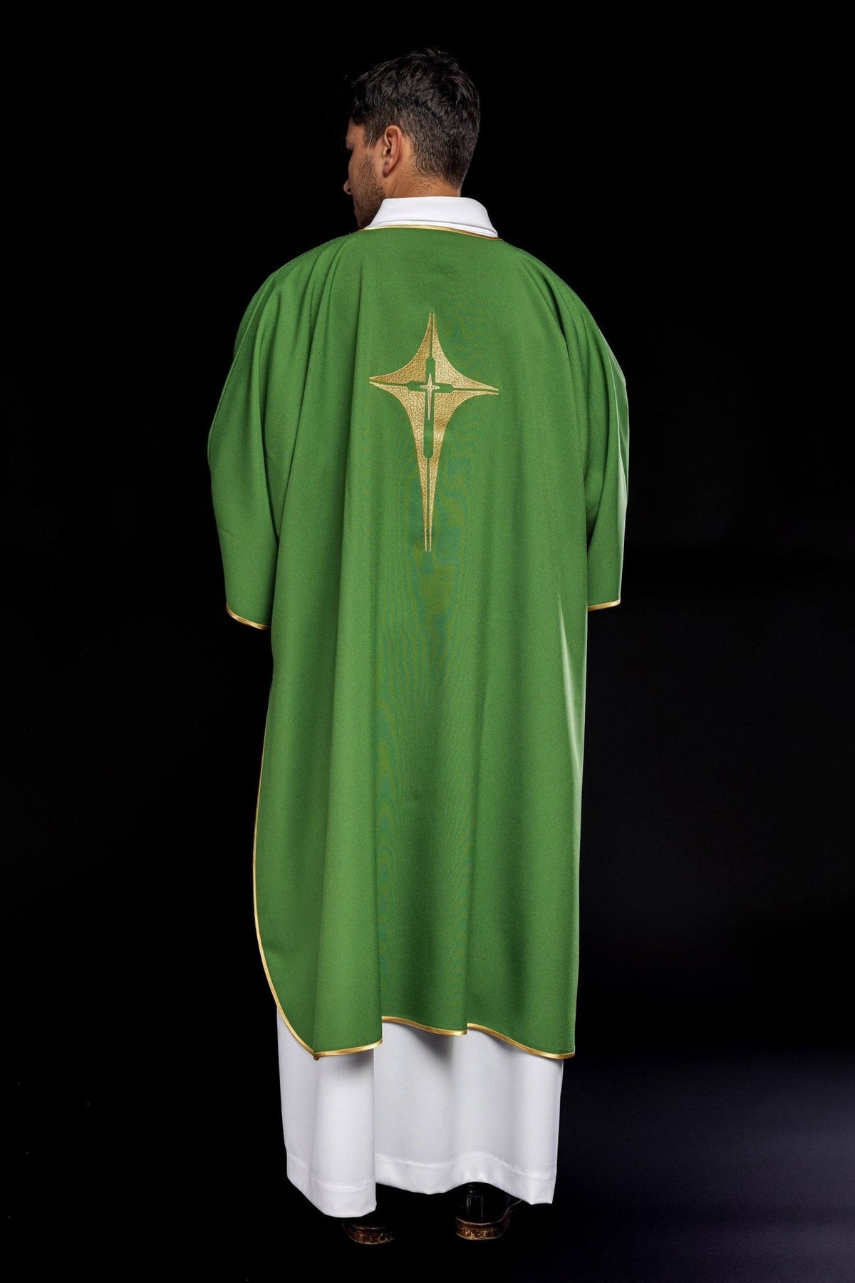 Green dalmatic back view with embroidered gold cross and gold trim