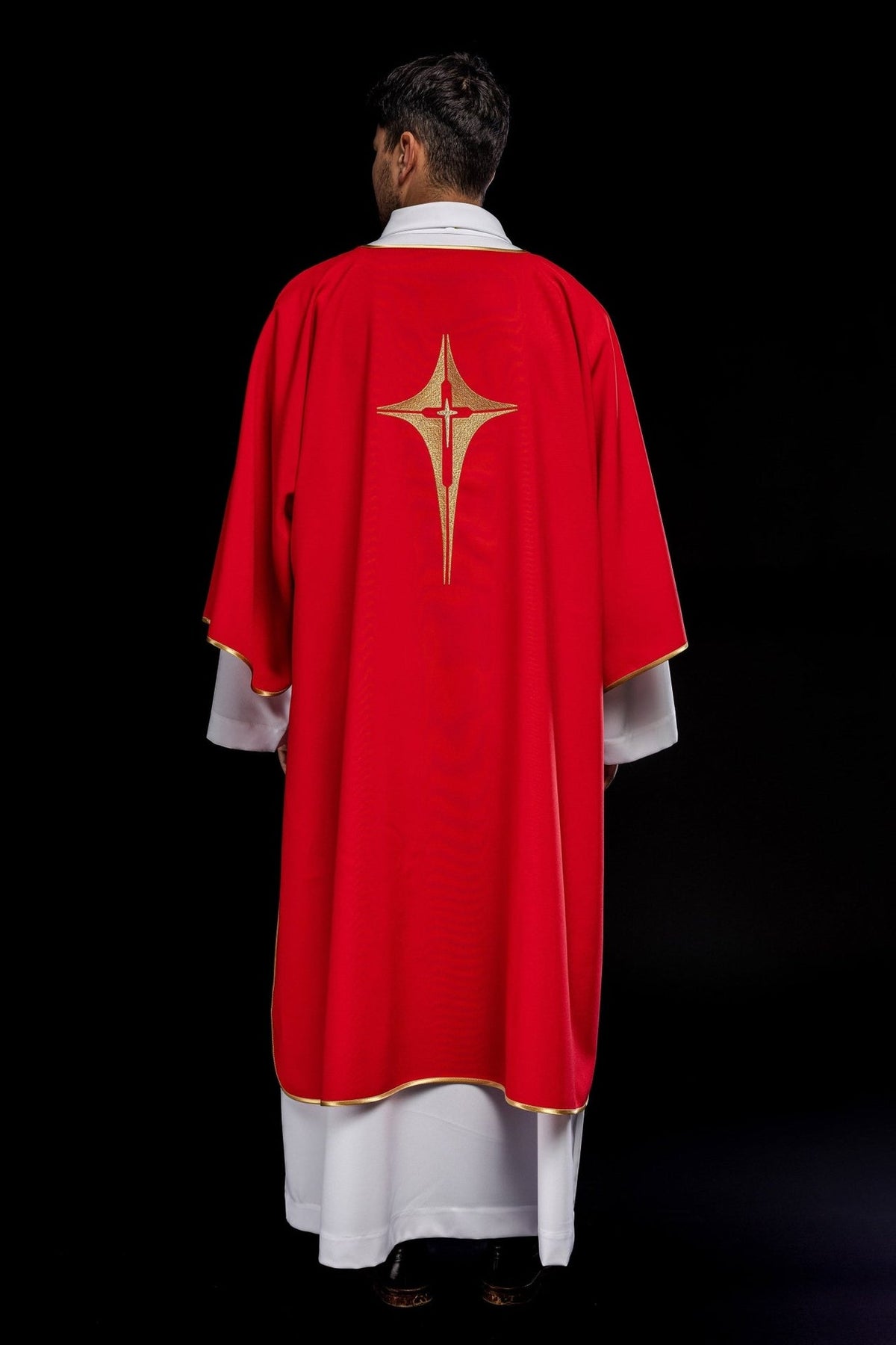 Red dalmatic back view with embroidered gold cross and gold trim