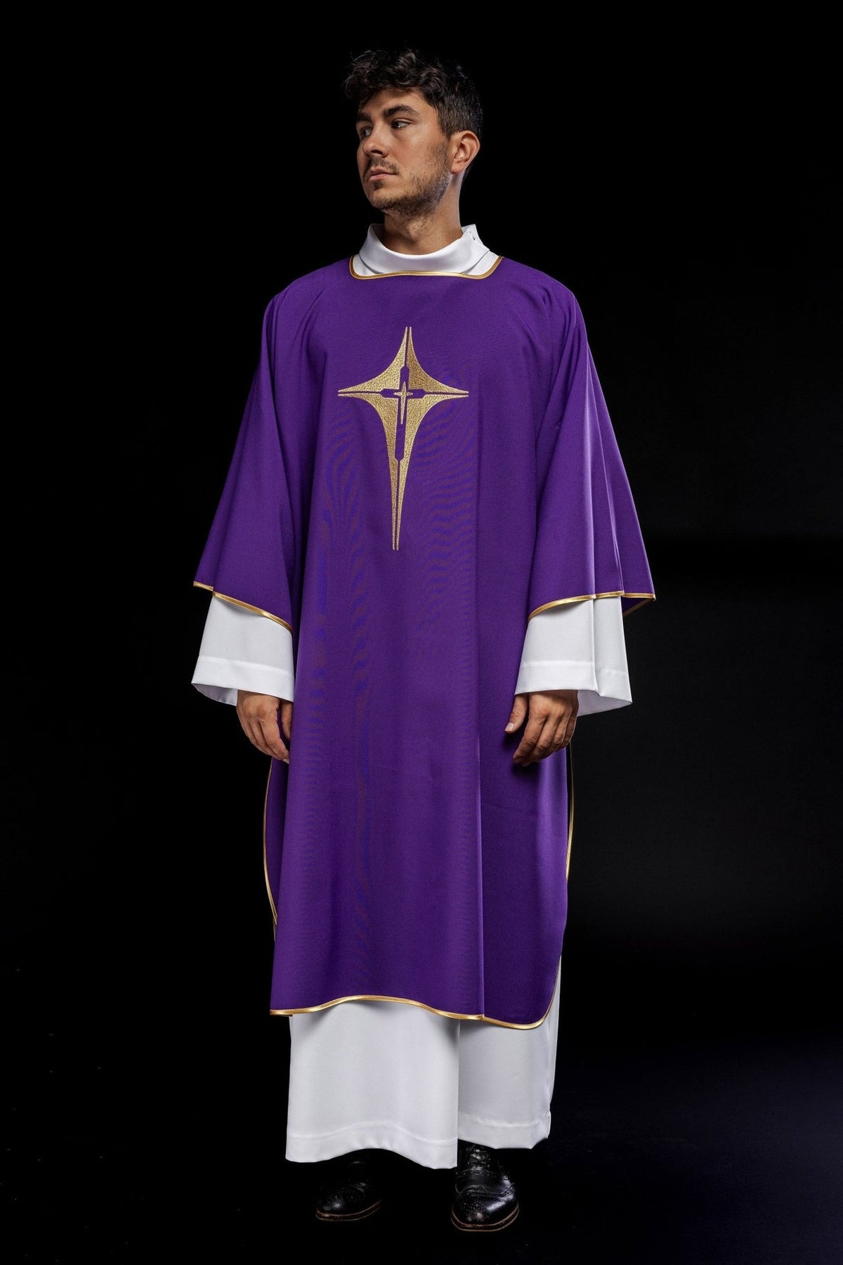 Purple dalmatic back view with embroidered gold cross and gold trim