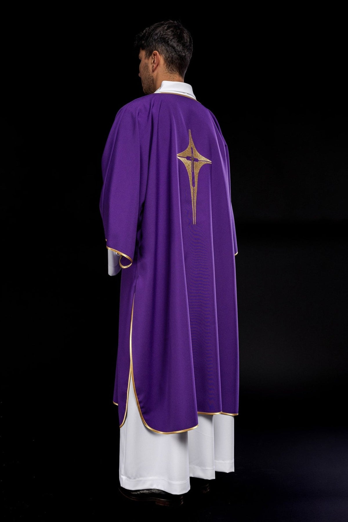 Purple dalmatic rear three-quarter view with embroidered gold cross