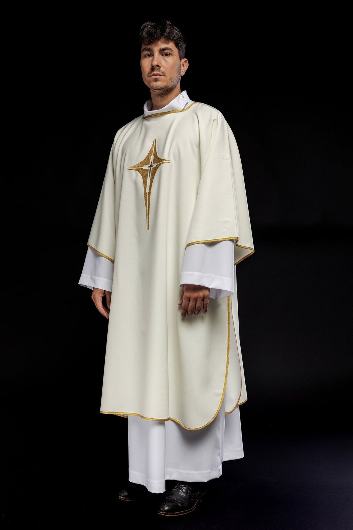 Ecru dalmatic with embroidered gold cross, full front view and gold trim