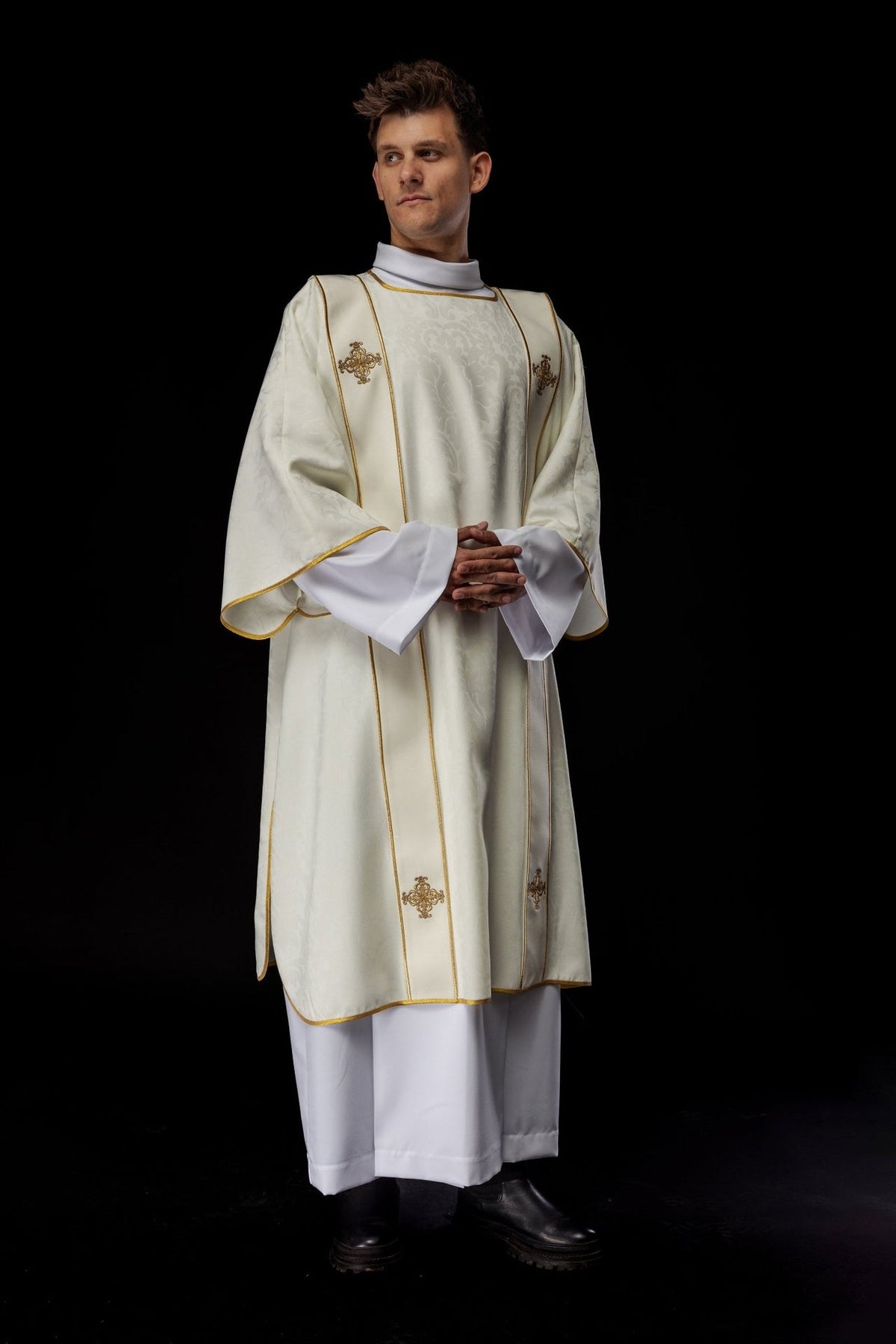 Ecru dalmatic three-quarter front view with jacquard fabric and gold trim