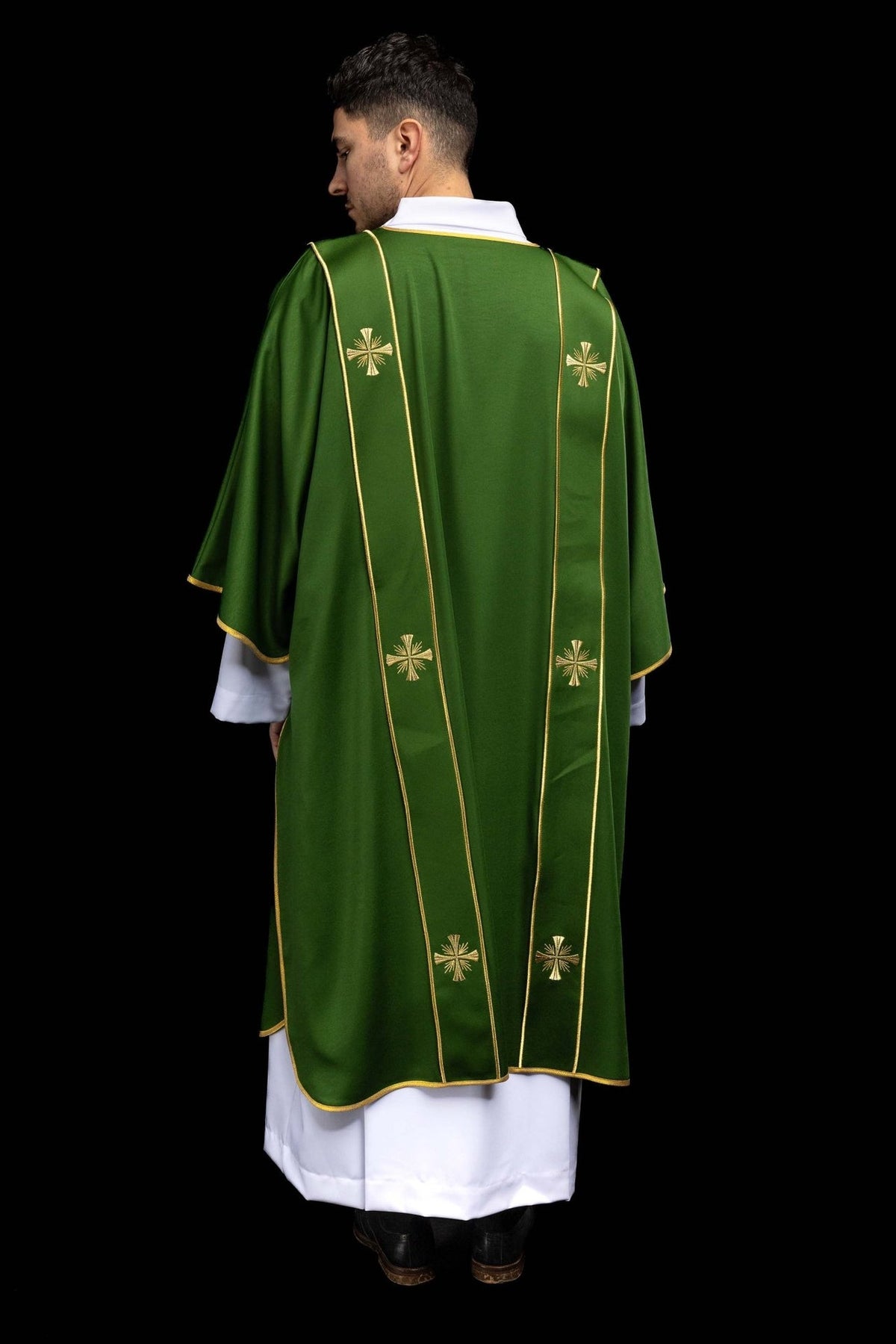 Green dalmatic back close-up with gold orphreys and crosses