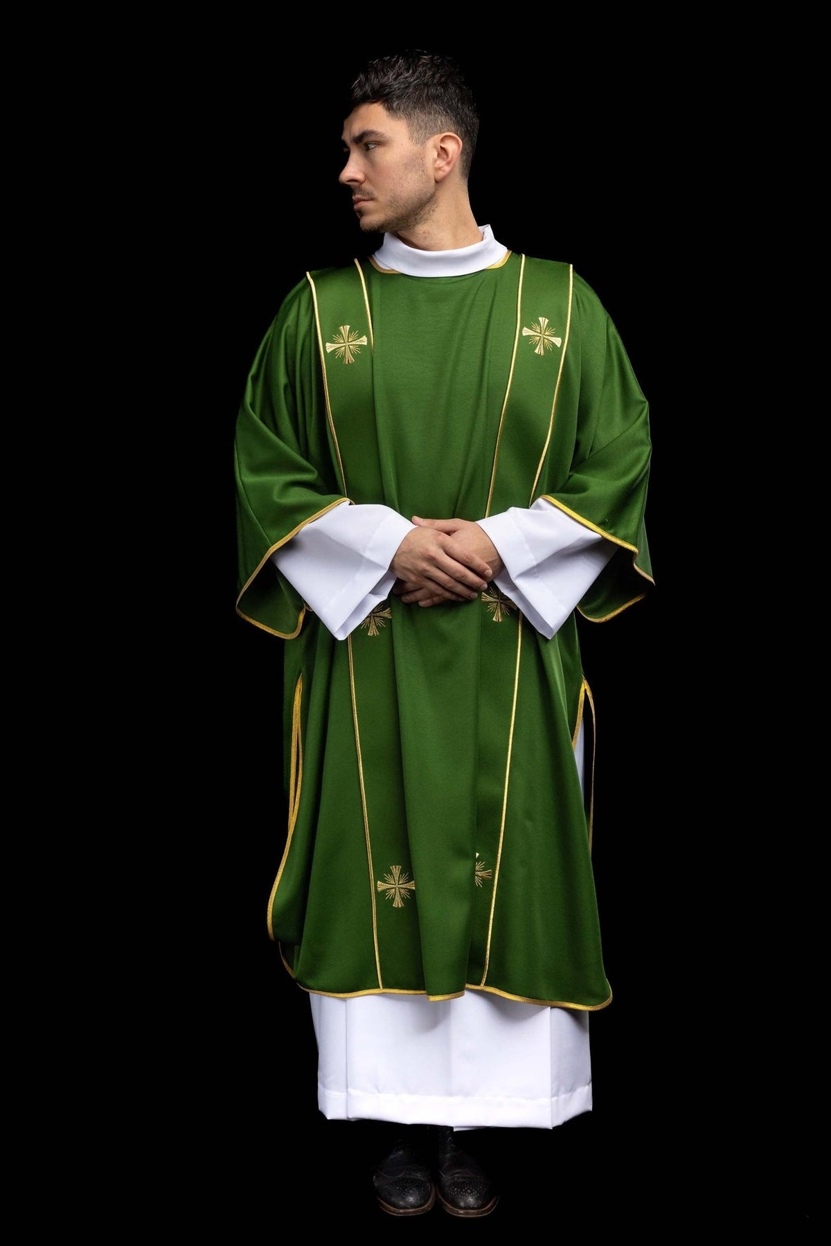 Green dalmatic rear three-quarter view with embroidered gold crosses