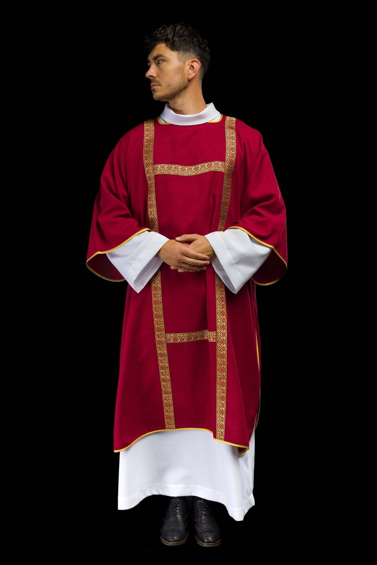Red dalmatic front view showing gold orphreys and trim