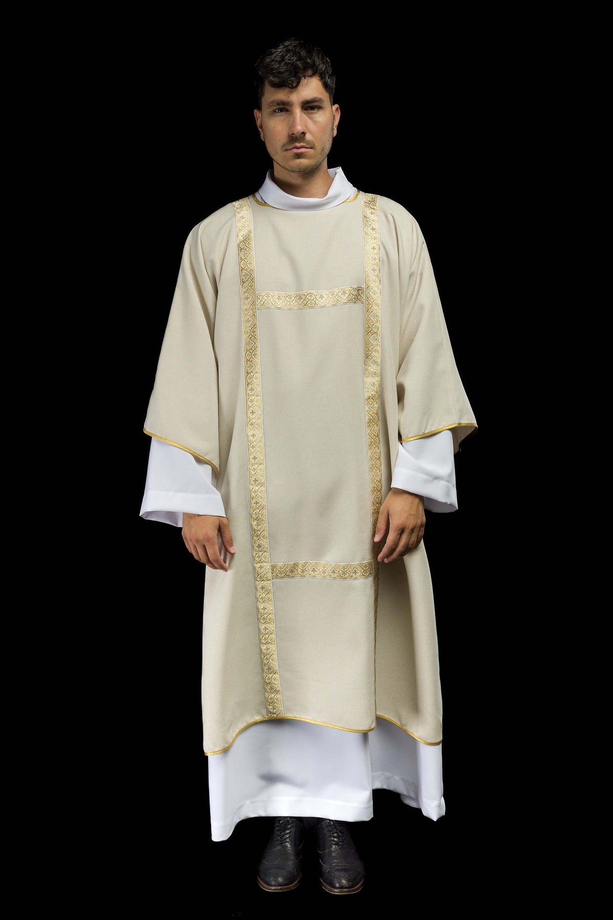 Ecru dalmatic front view with gold jacquard orphreys and gold trim