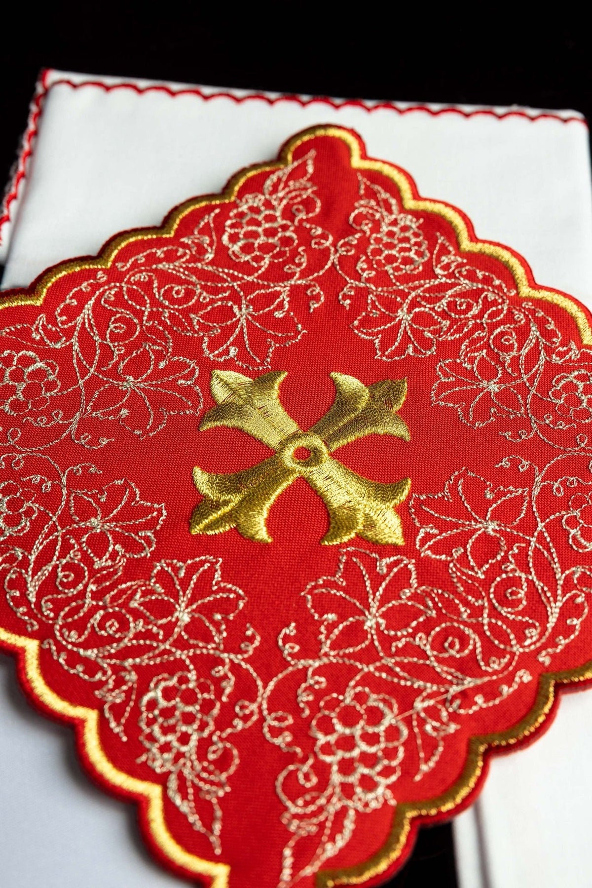 Altar linen set close-up showing gold cross and floral embroidery