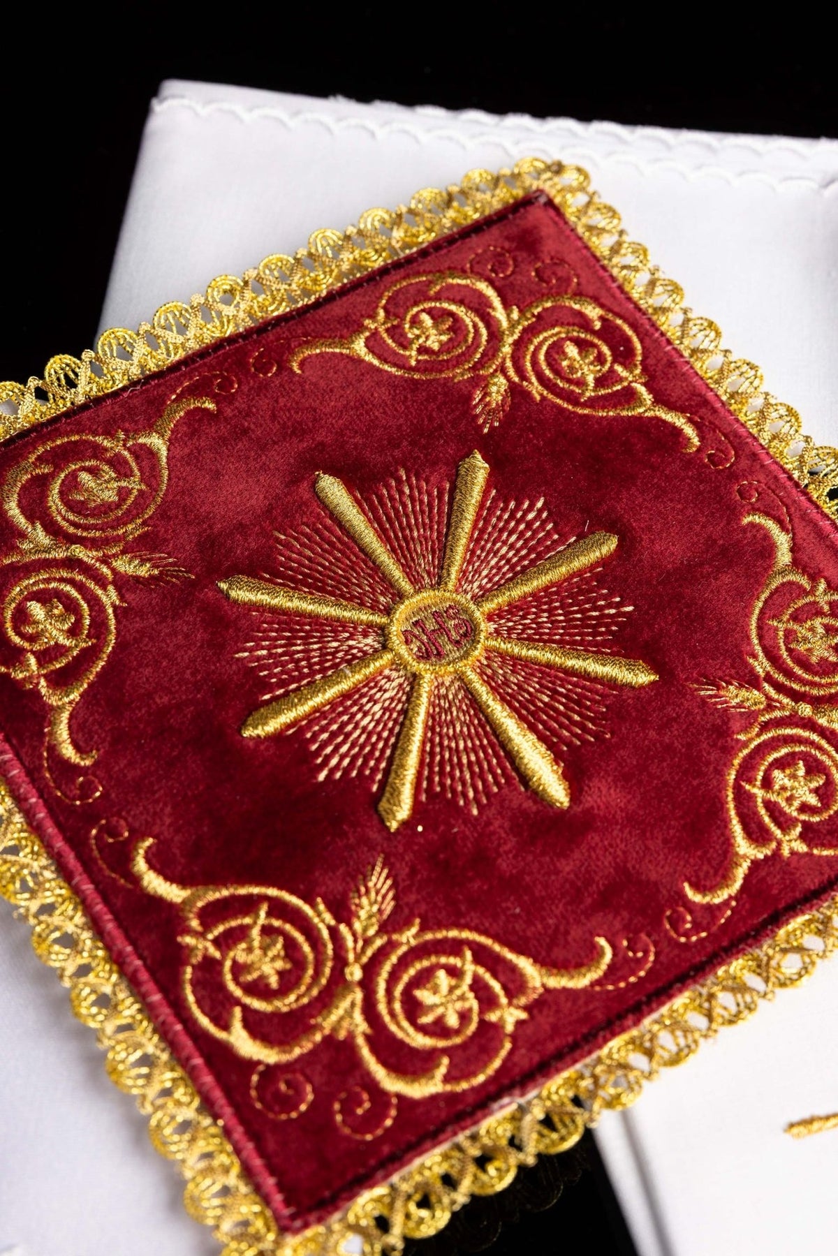 Red velvet chalice pall with gold IHS monogram, embroidery and decorative gold trim