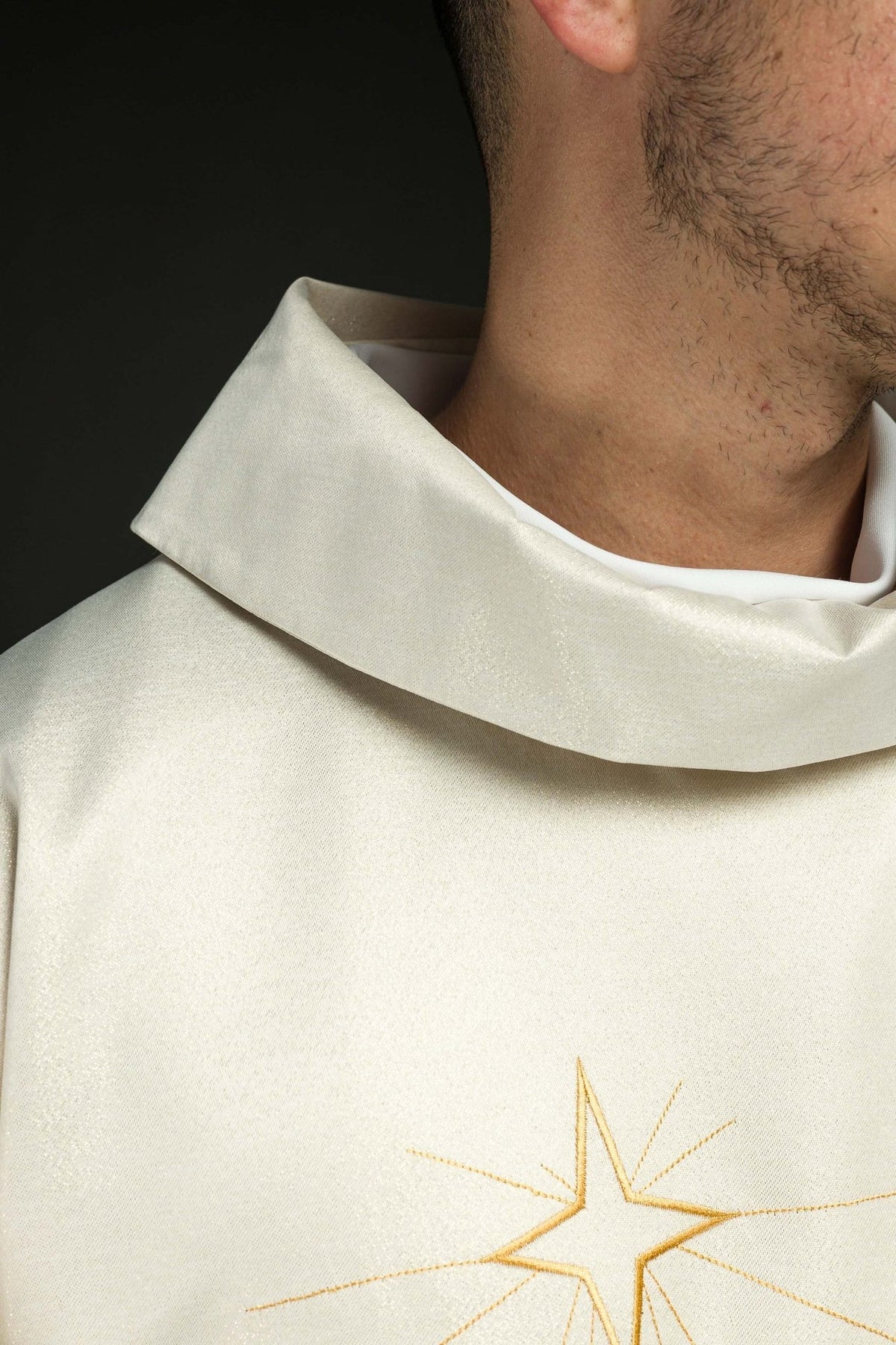 Epiphany chasuble, close-up of ivory stand-up collar and star embroidery