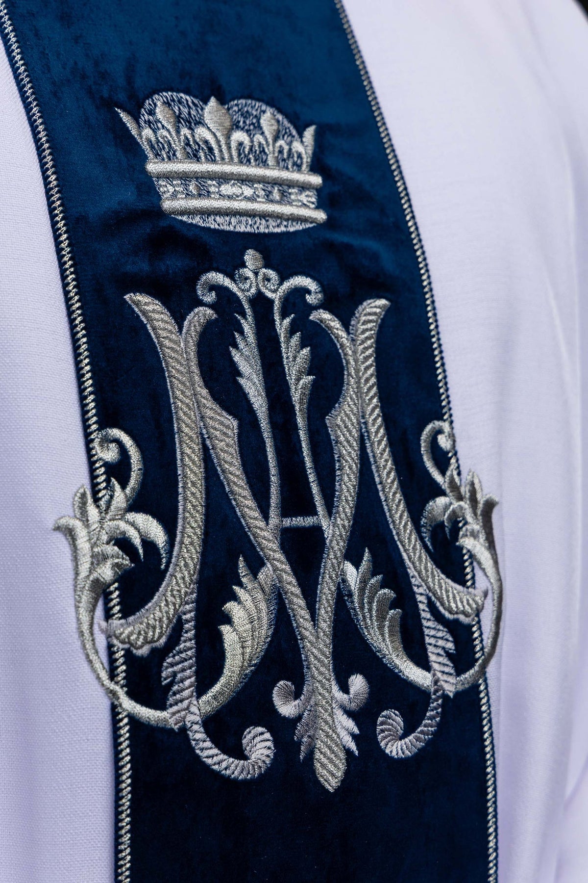 Marian chasuble close-up showing embroidered crown and Marian motif on velvet orphrey