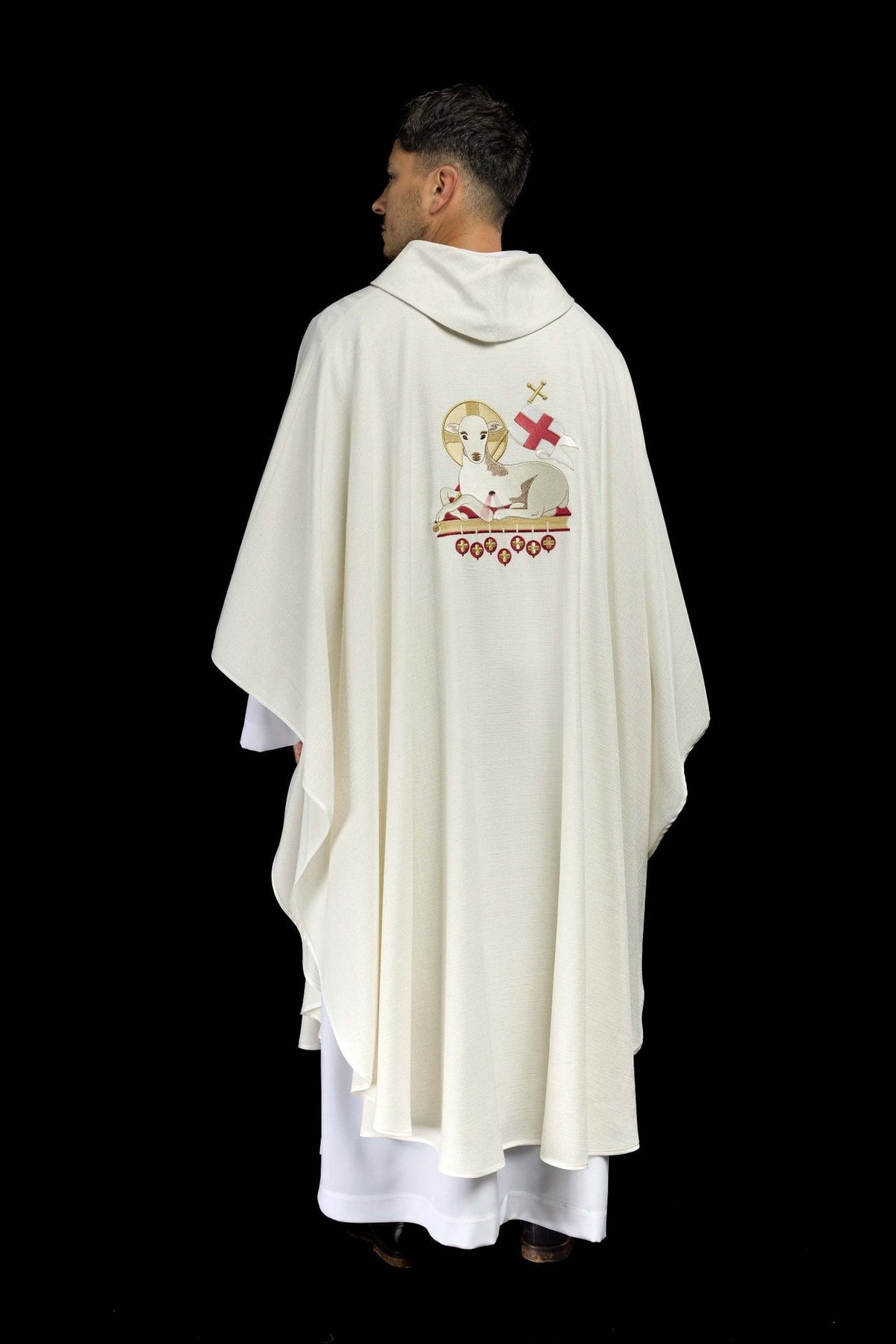 Lamb chasuble back view with natural fabric and embroidered Agnus Dei