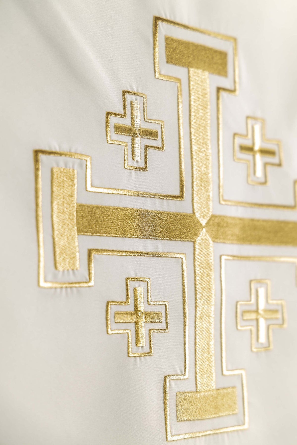 Church lectern cover close-up of gold Jerusalem cross embroidery details