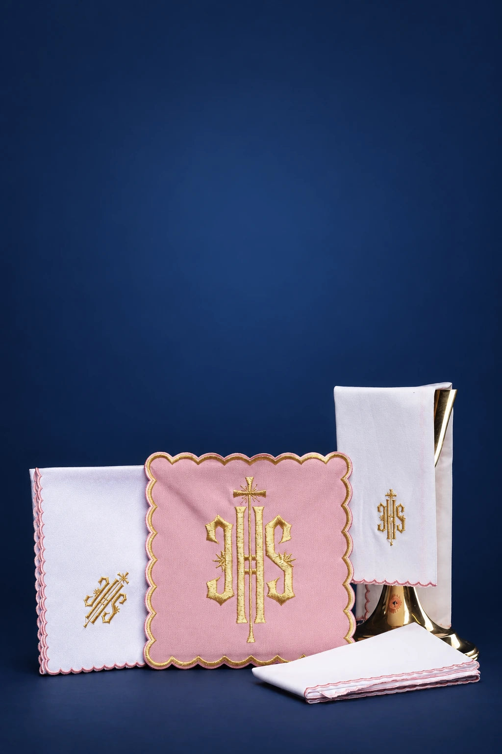 Embroidered IHS Rose Altar Linen Set shown together in white and rose with gold embroidery