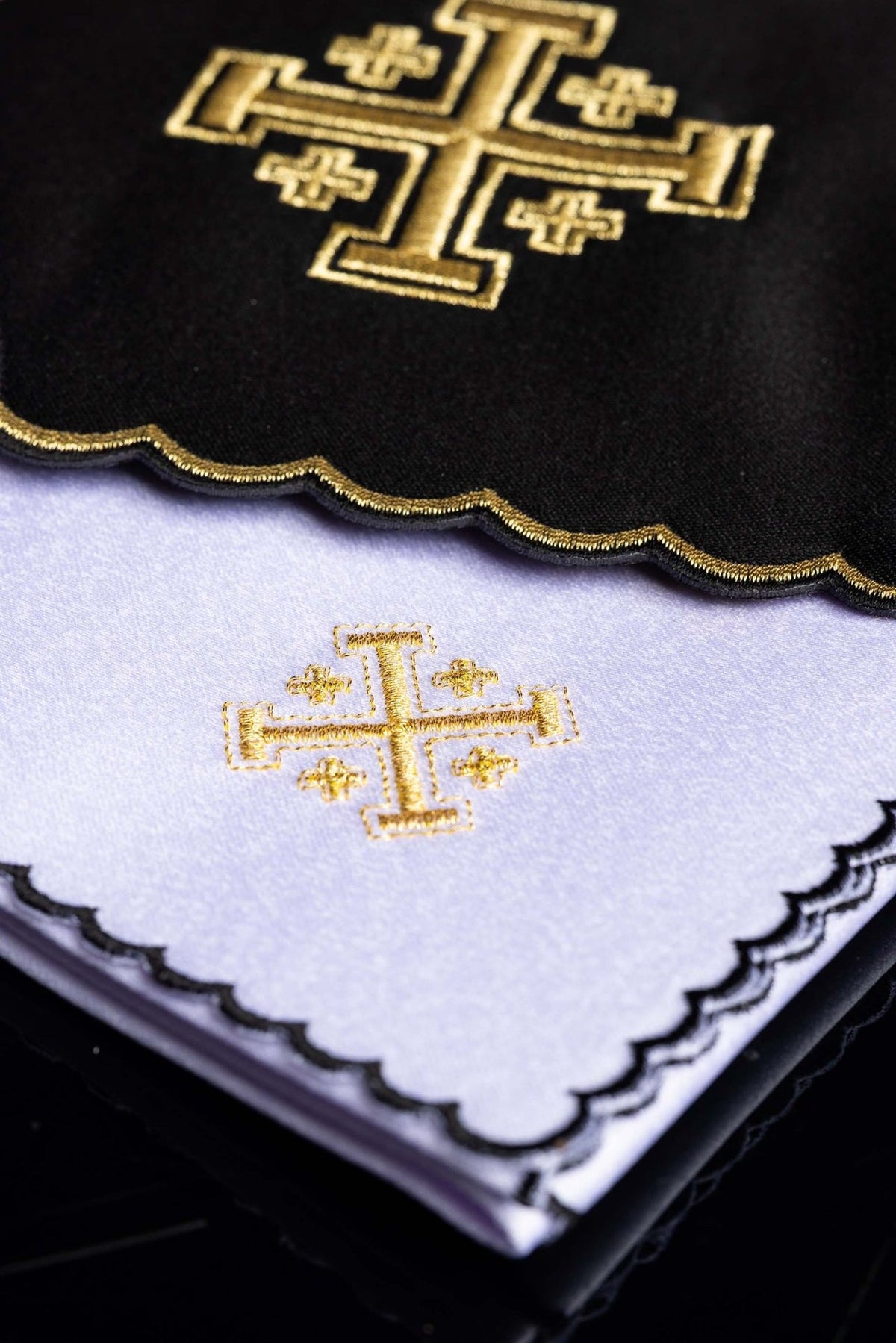 Altar linen set close-up showing gold Jerusalem cross embroidery and scalloped edge