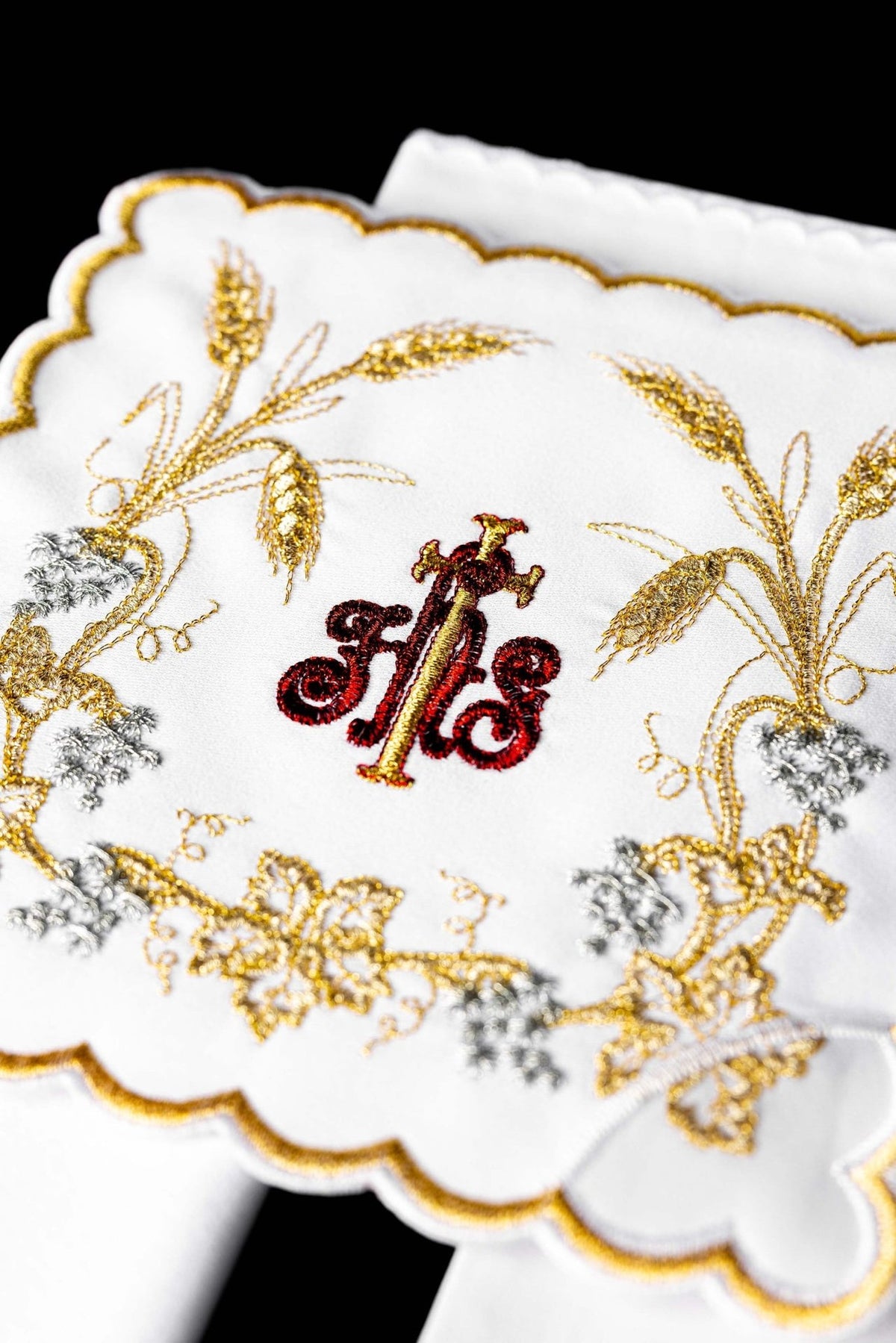 Altar linen set close-up with red and gold IHS, gold wheat and silver floral embroidery