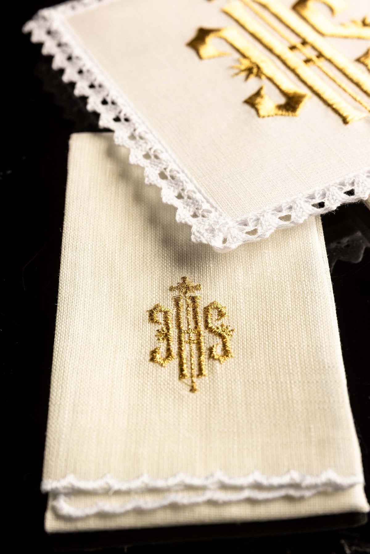 Altar linen set folded with gold IHS embroidery and scalloped white lace trim