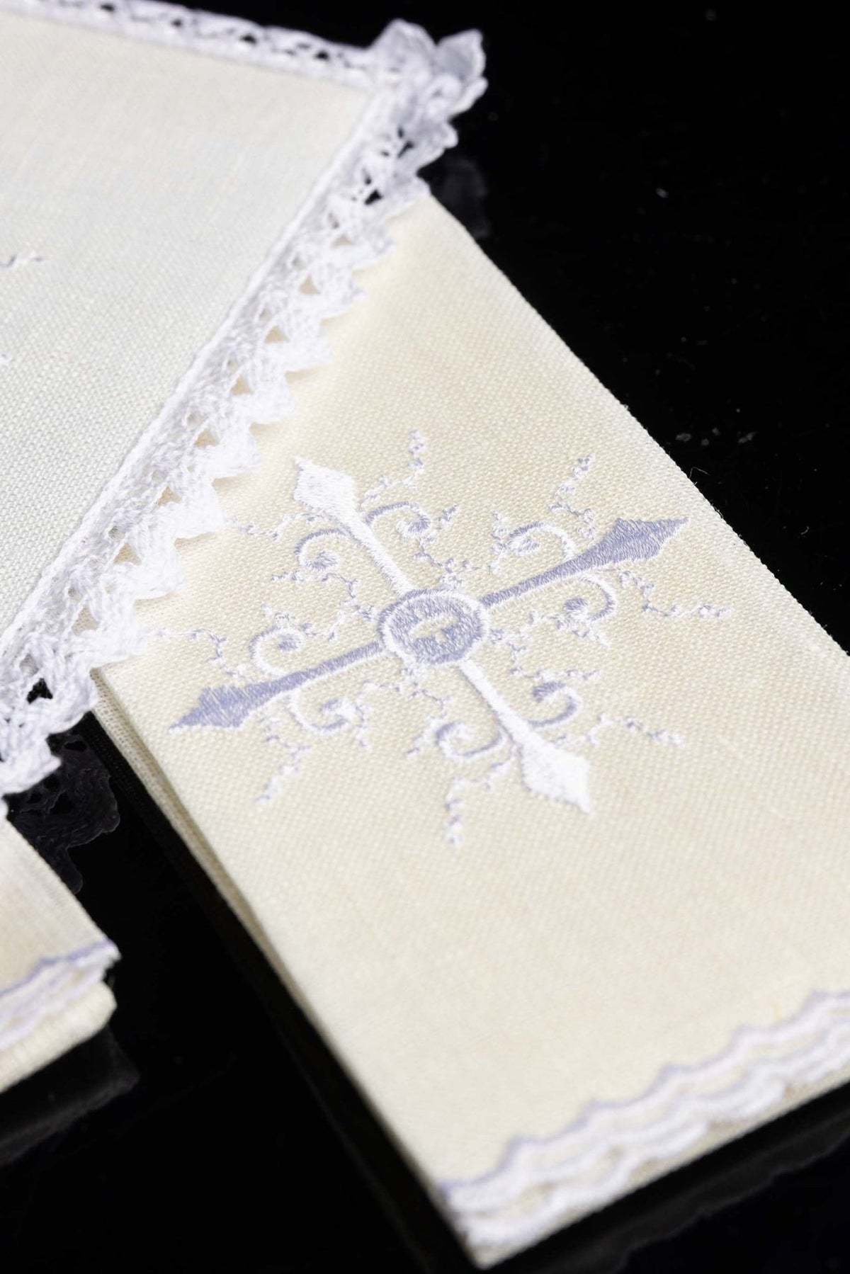 Altar linen set folded detail with cross embroidery and scalloped trim
