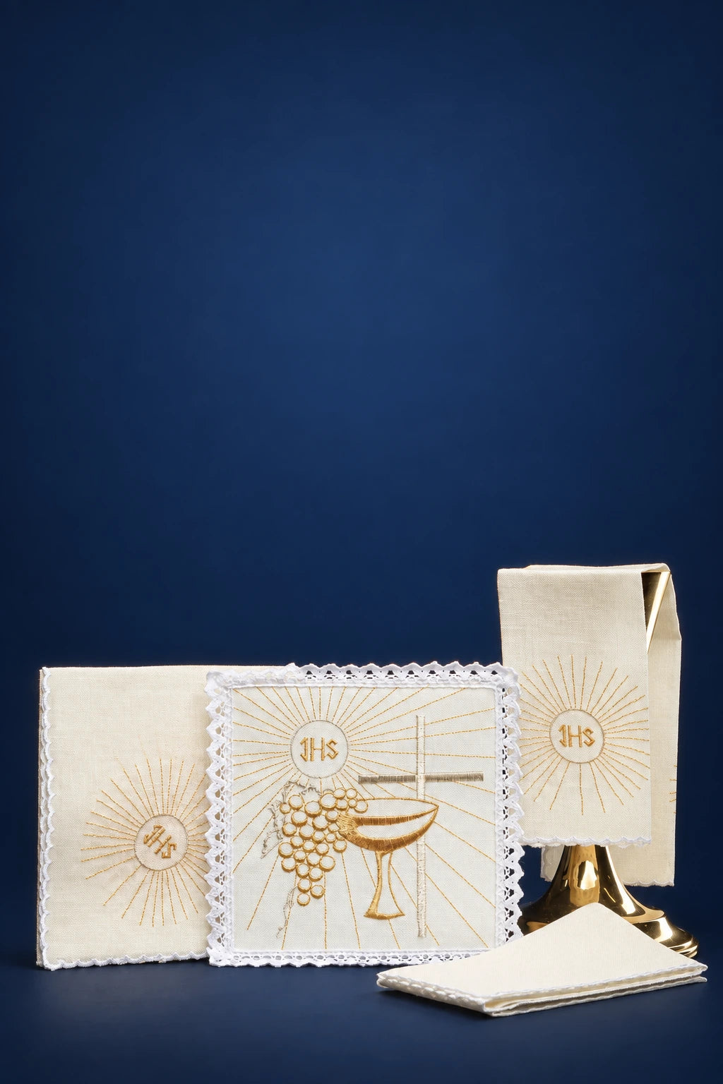 Altar Linen Set Made of Linen with Chalice and Cross Embroidery, showing white linen pieces with gold embroidery