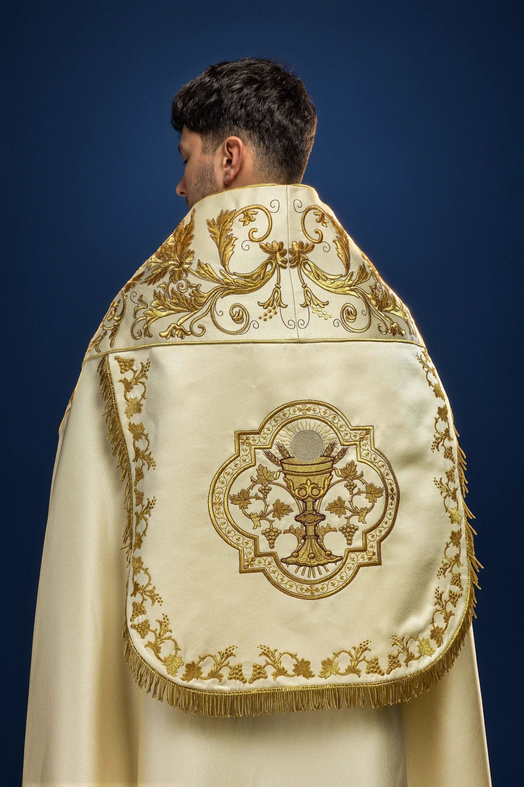 Ecru Satin Roman Cope with Chalice Embroidery, back view with gold chalice embroidery and floral border