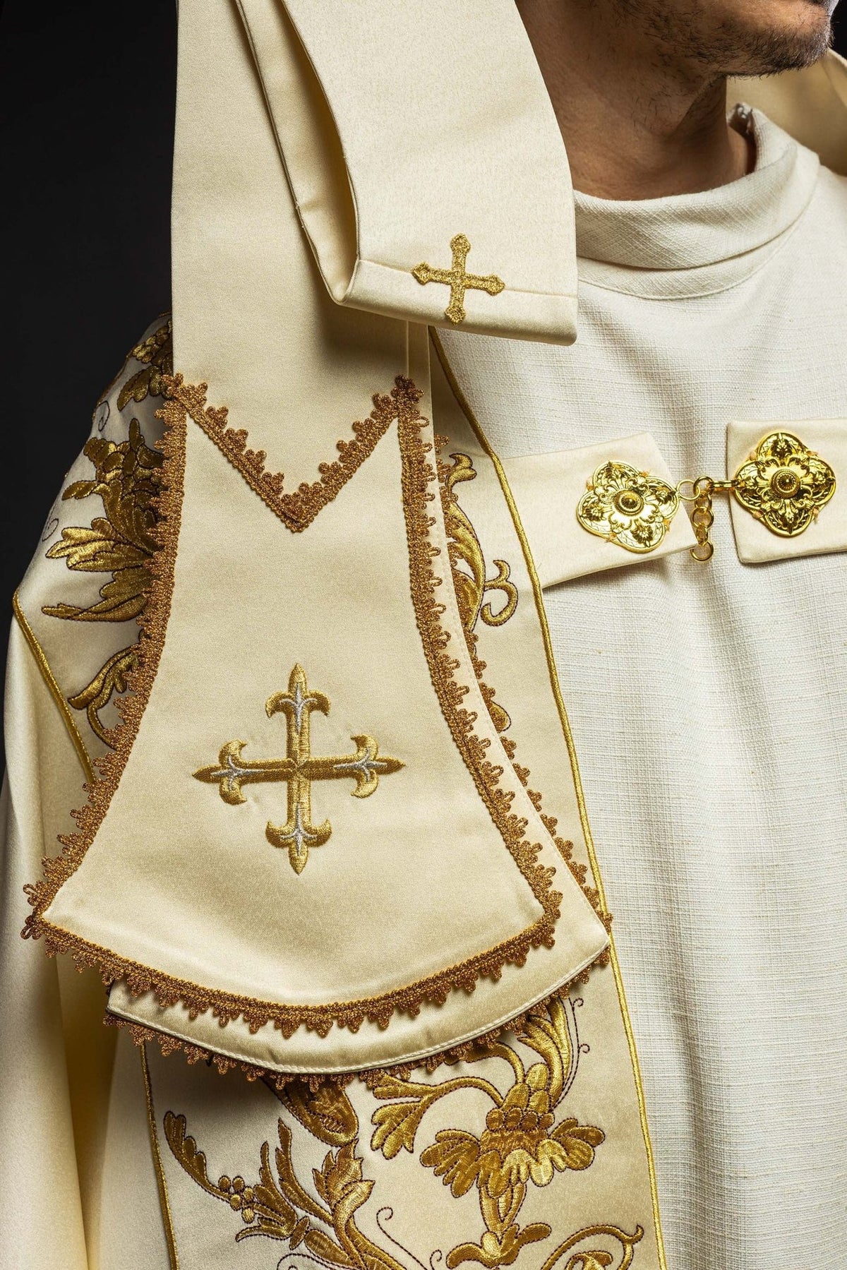 Ecru satin cope, close-up of embroidered stole with gold cross and trim