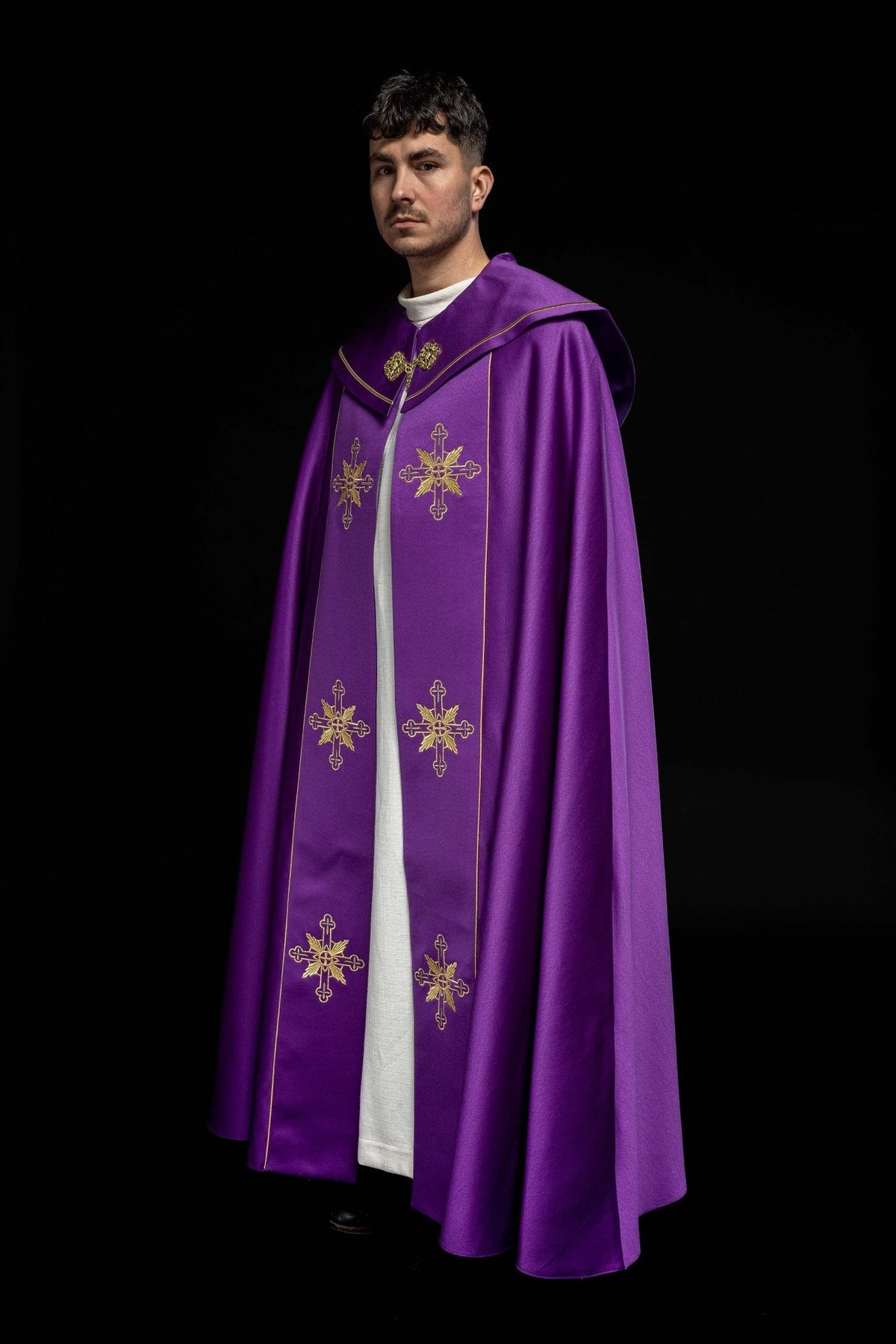 Purple cope front view with gold cross embroidery and satin finish