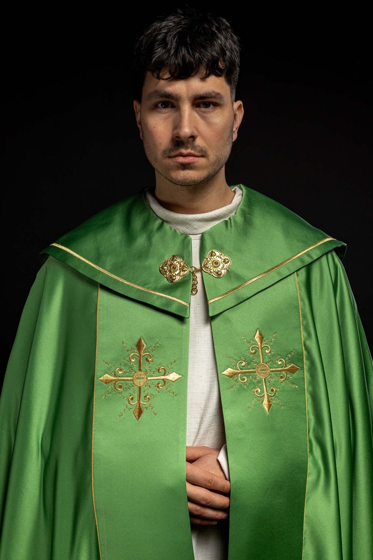 Green cope upper front with gold cross embroidery and satin edging