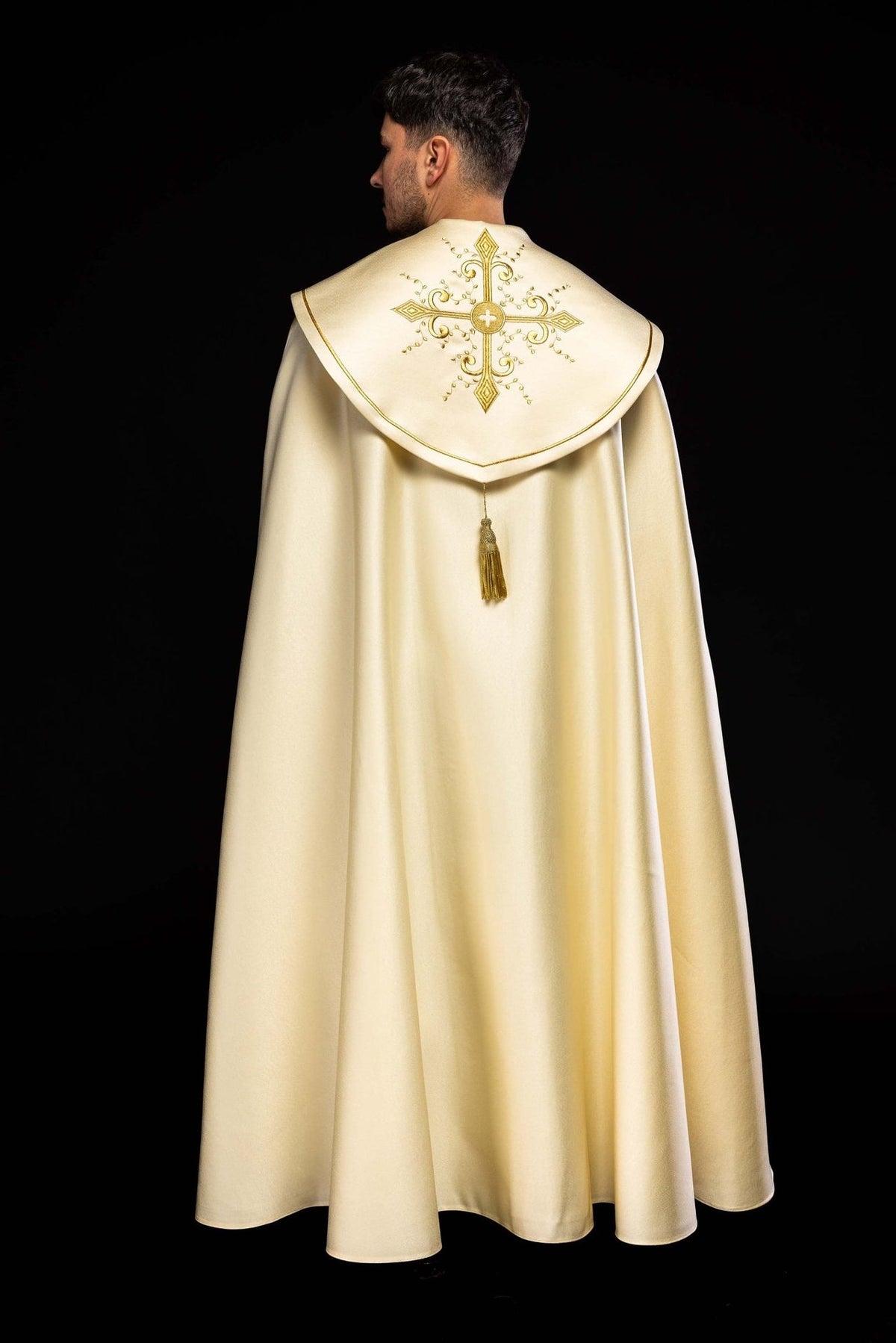 Ecru cope, back view with large embroidered gold cross and tassel