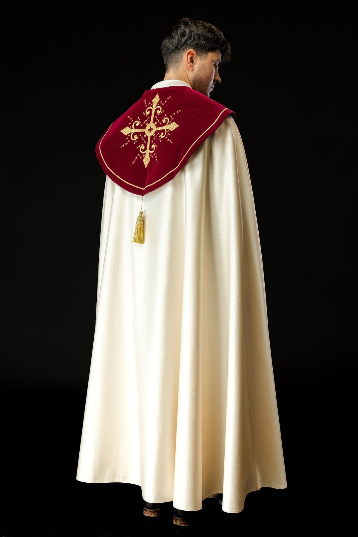 Burgundy velvet cope back view with gold cross embroidery and tassel