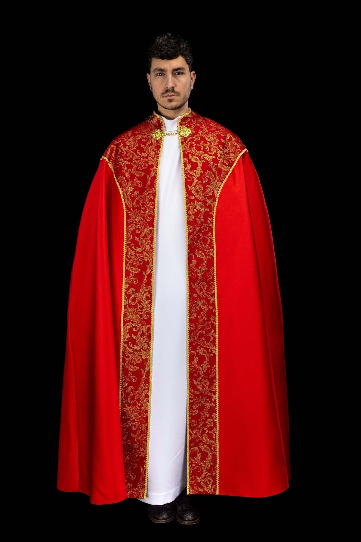 Red cope, front view with gold jacquard fabric panels and trim