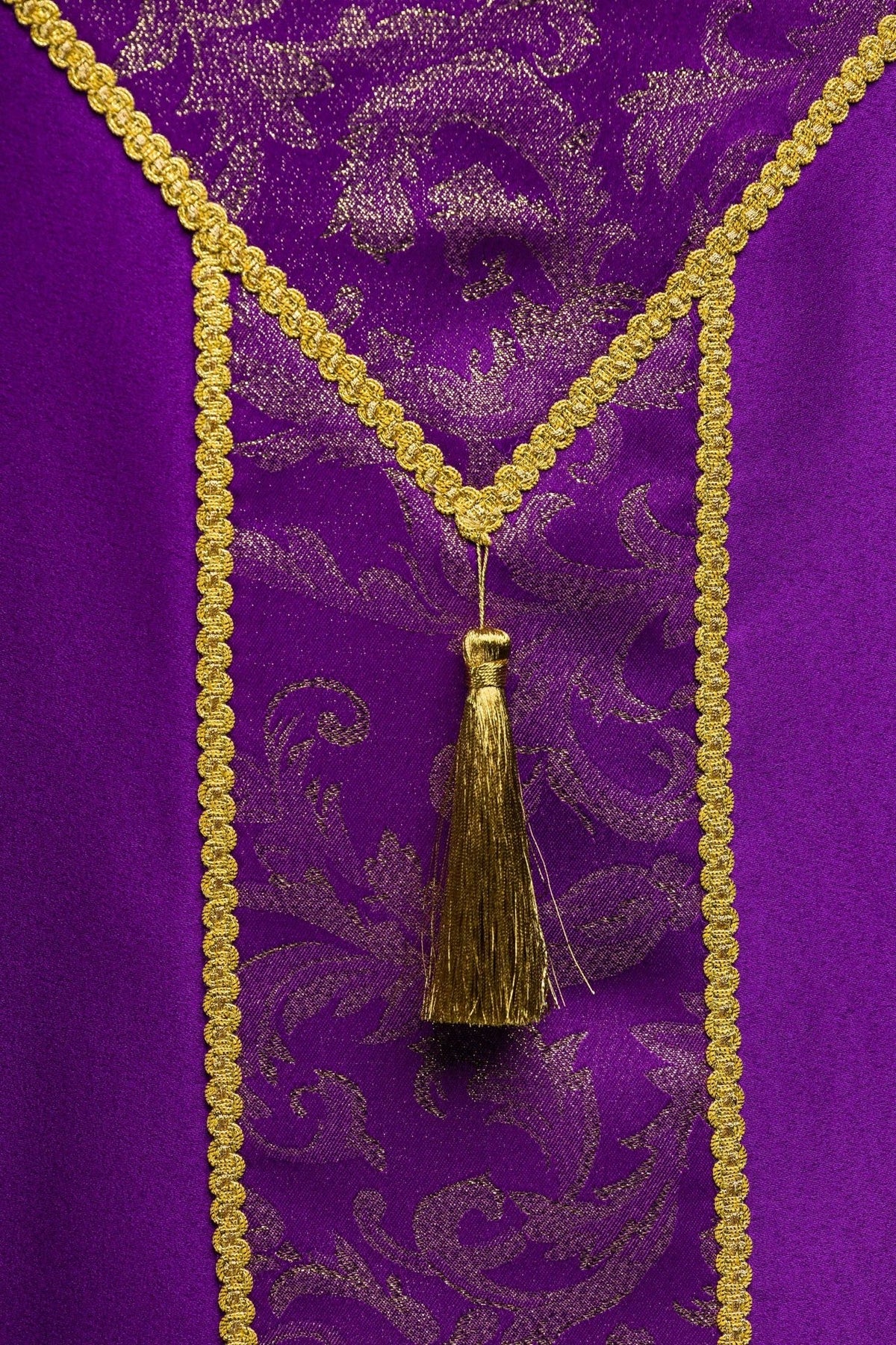 Purple cope side-back close-up with gold jacquard fabric yoke and trim