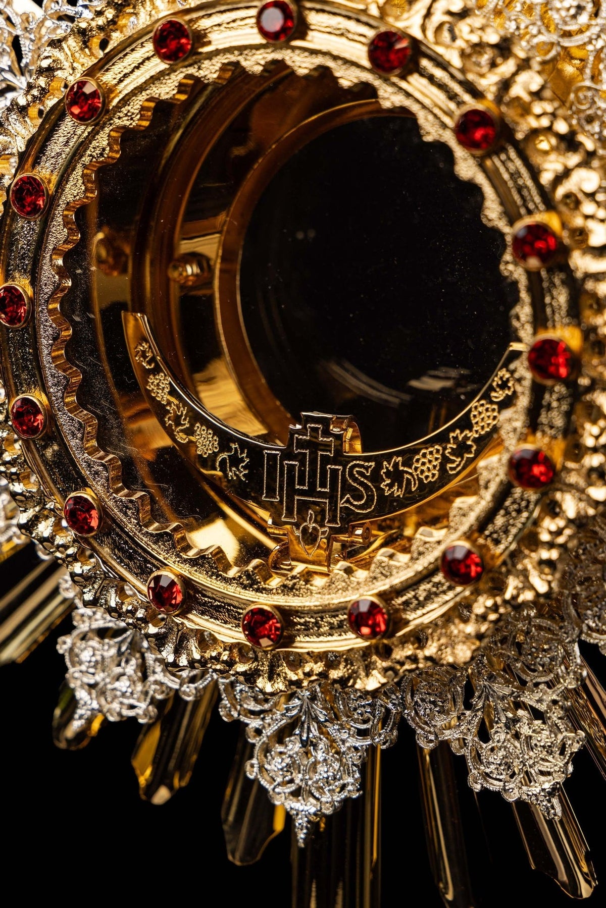 Monstrance side close-up of layered sunburst rays and filigree ornaments
