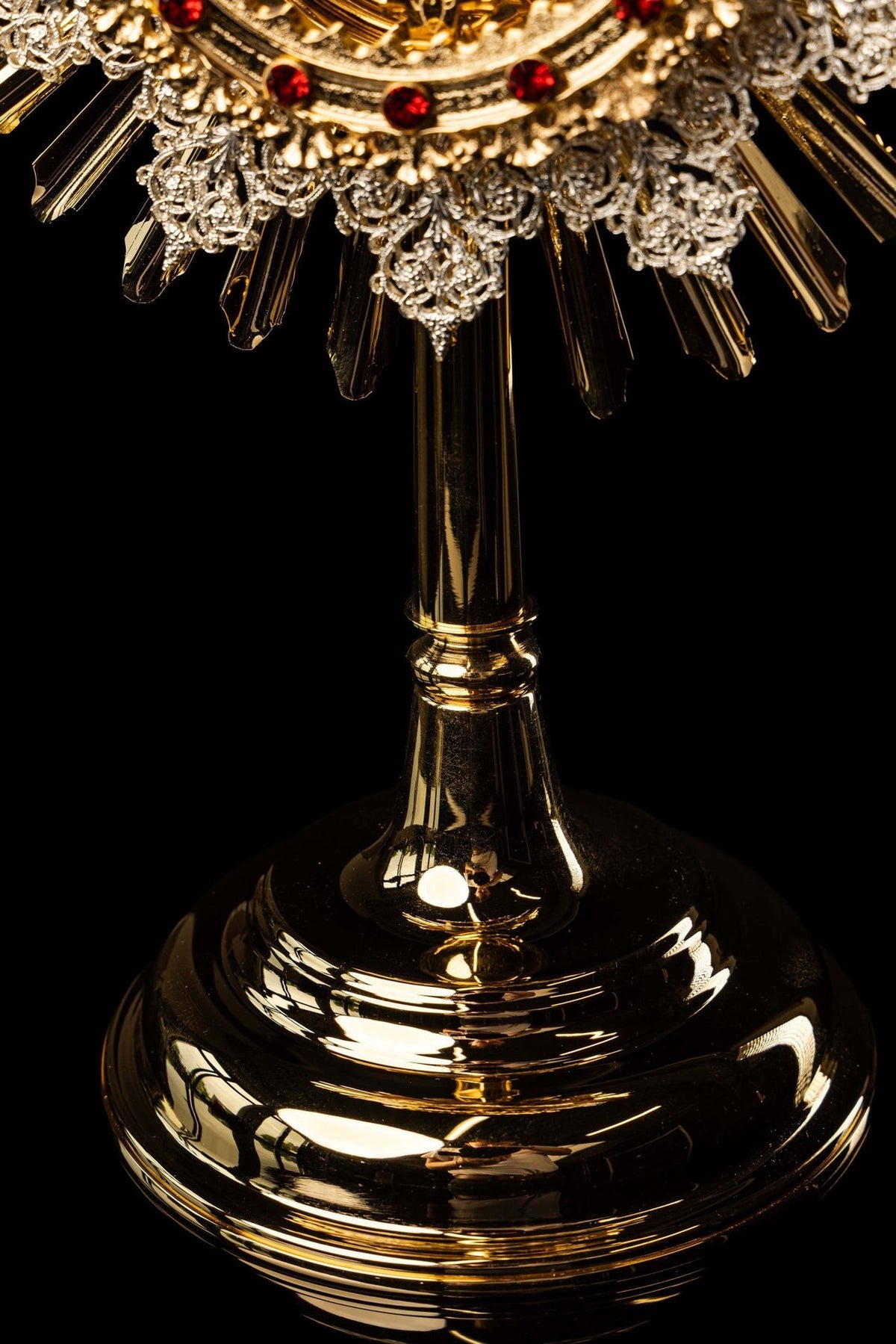 Monstrance close-up of polished stem and tiered circular base