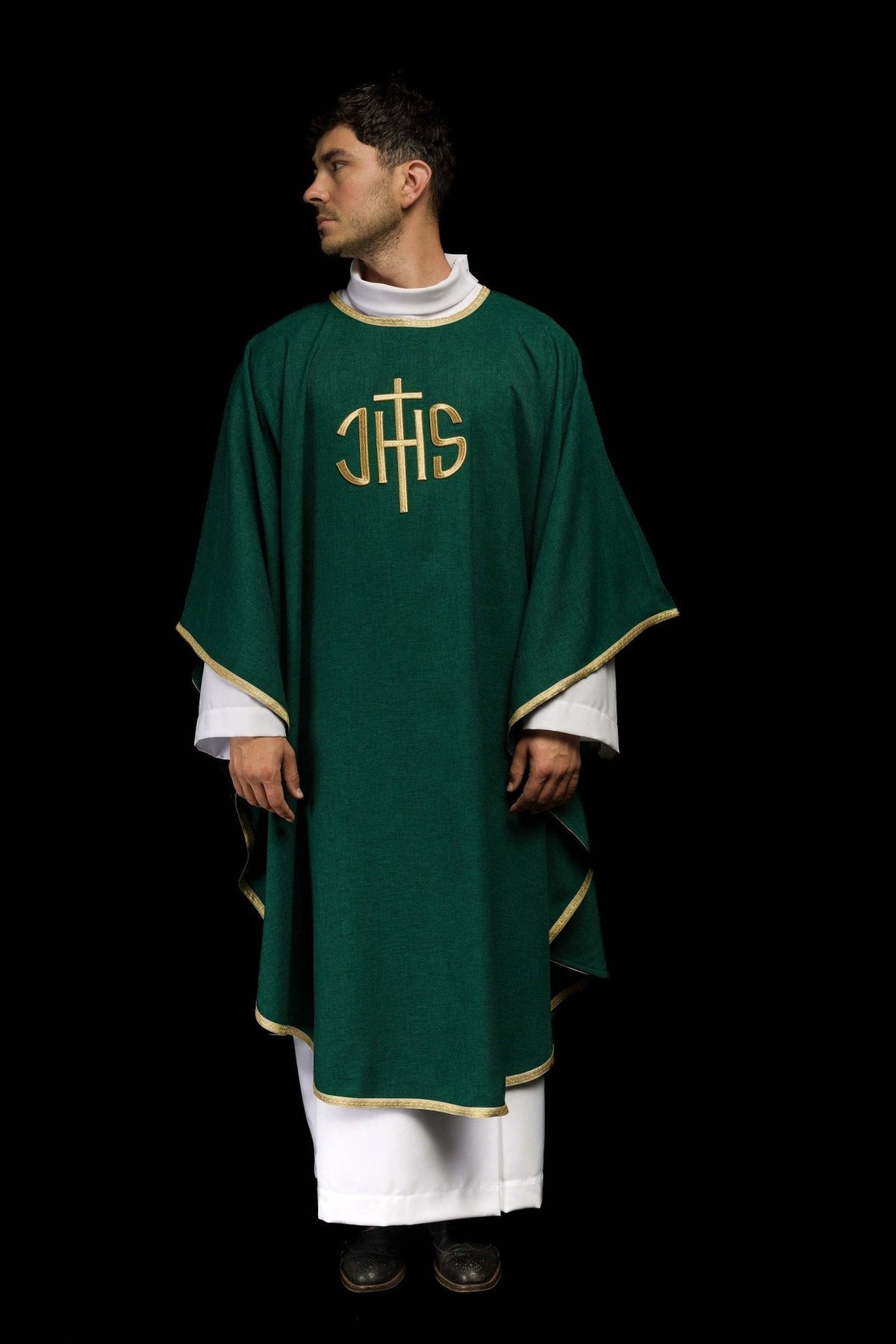 Green chasuble worn in a full front view with gold IHS embroidery