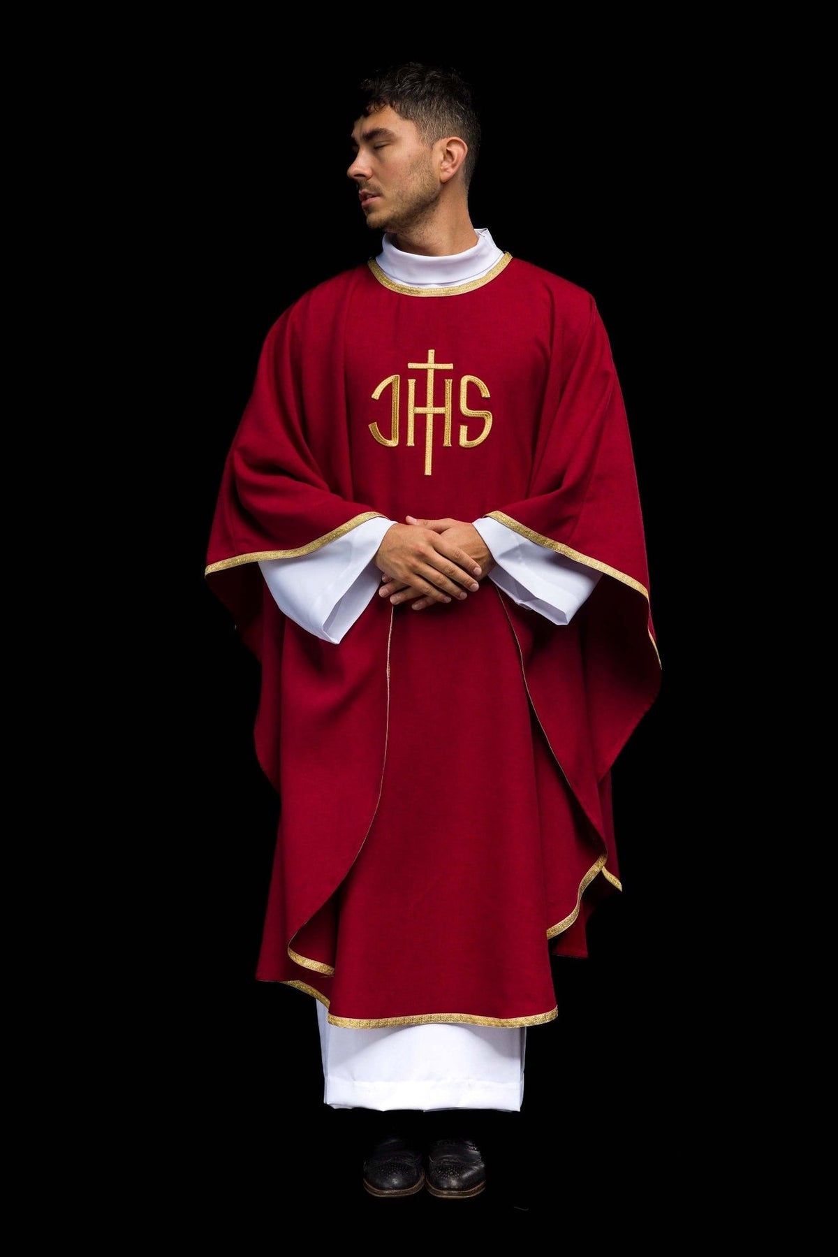 Red chasuble back view with gold trim