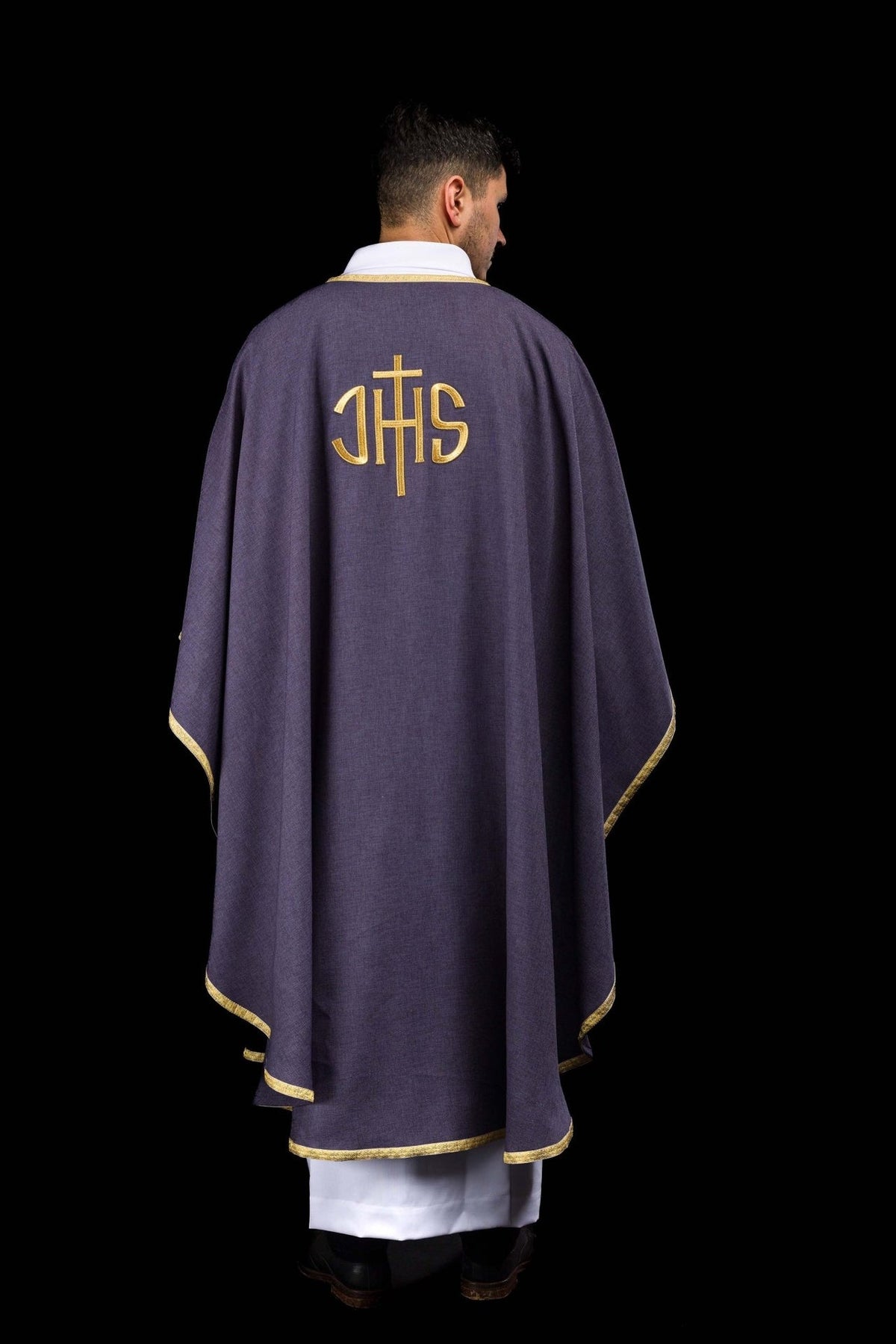 Purple chasuble back view with gold IHS embroidery and trim