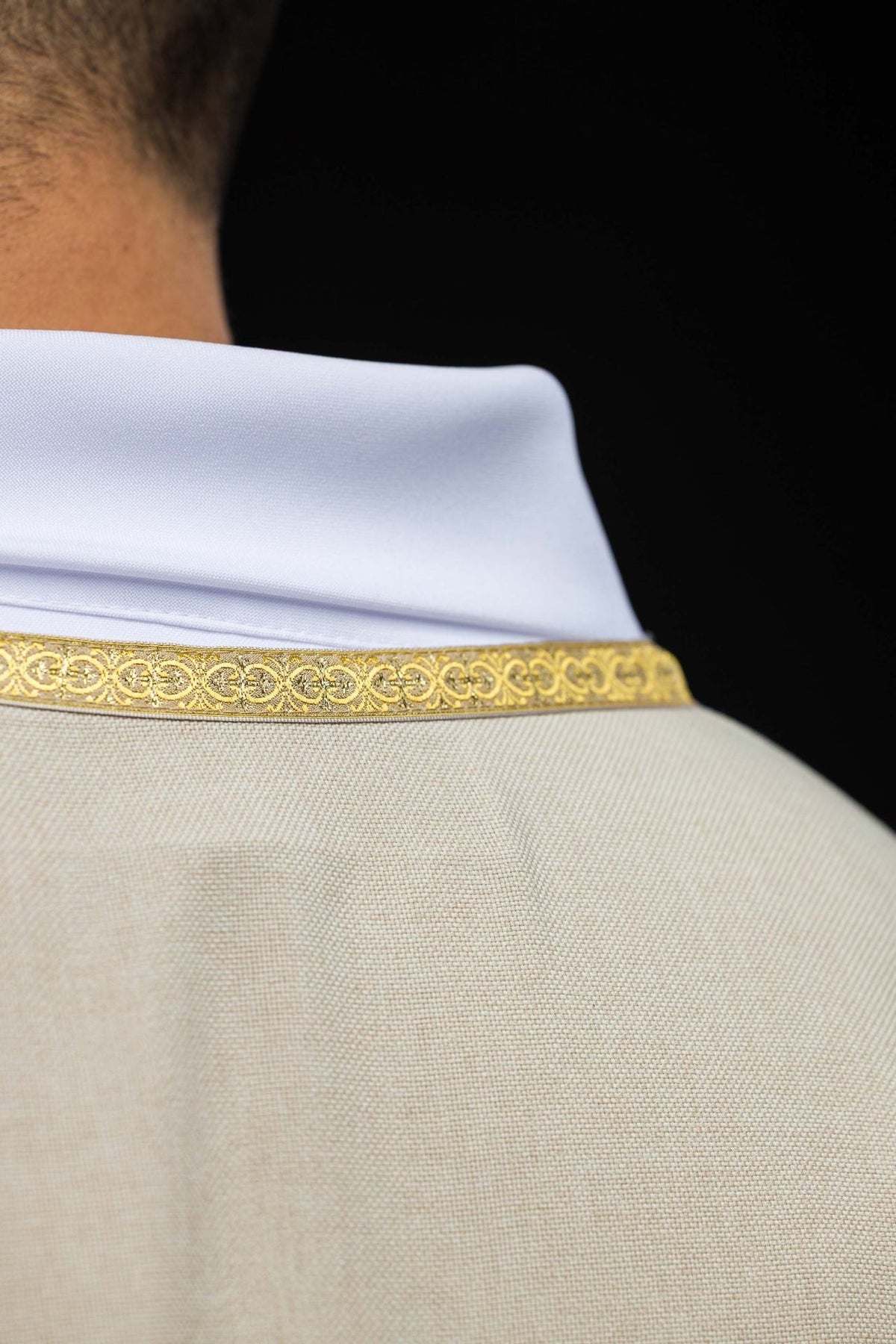 Ecru chasuble back view with gold IHS embroidery