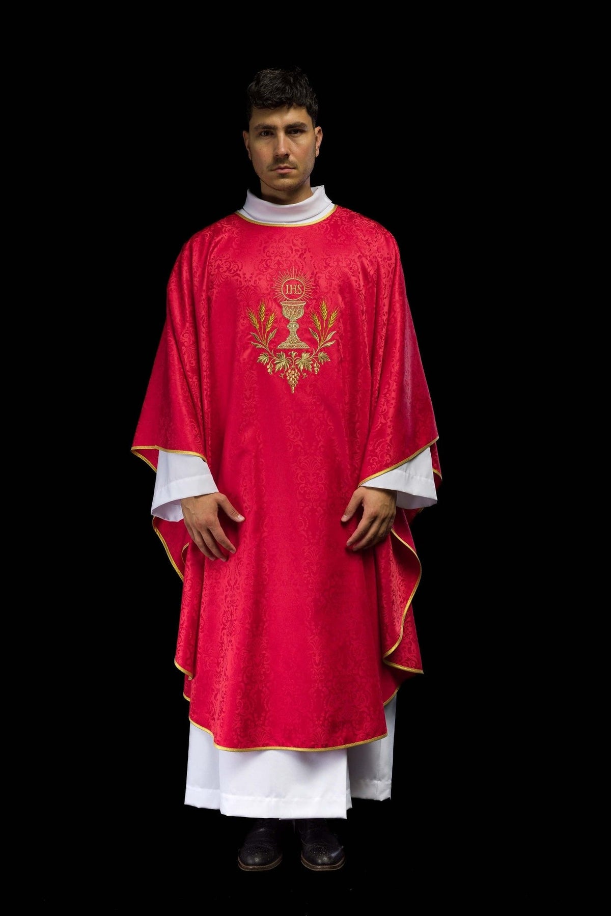 Red liturgical chasuble, full front view with gold chalice embroidery
