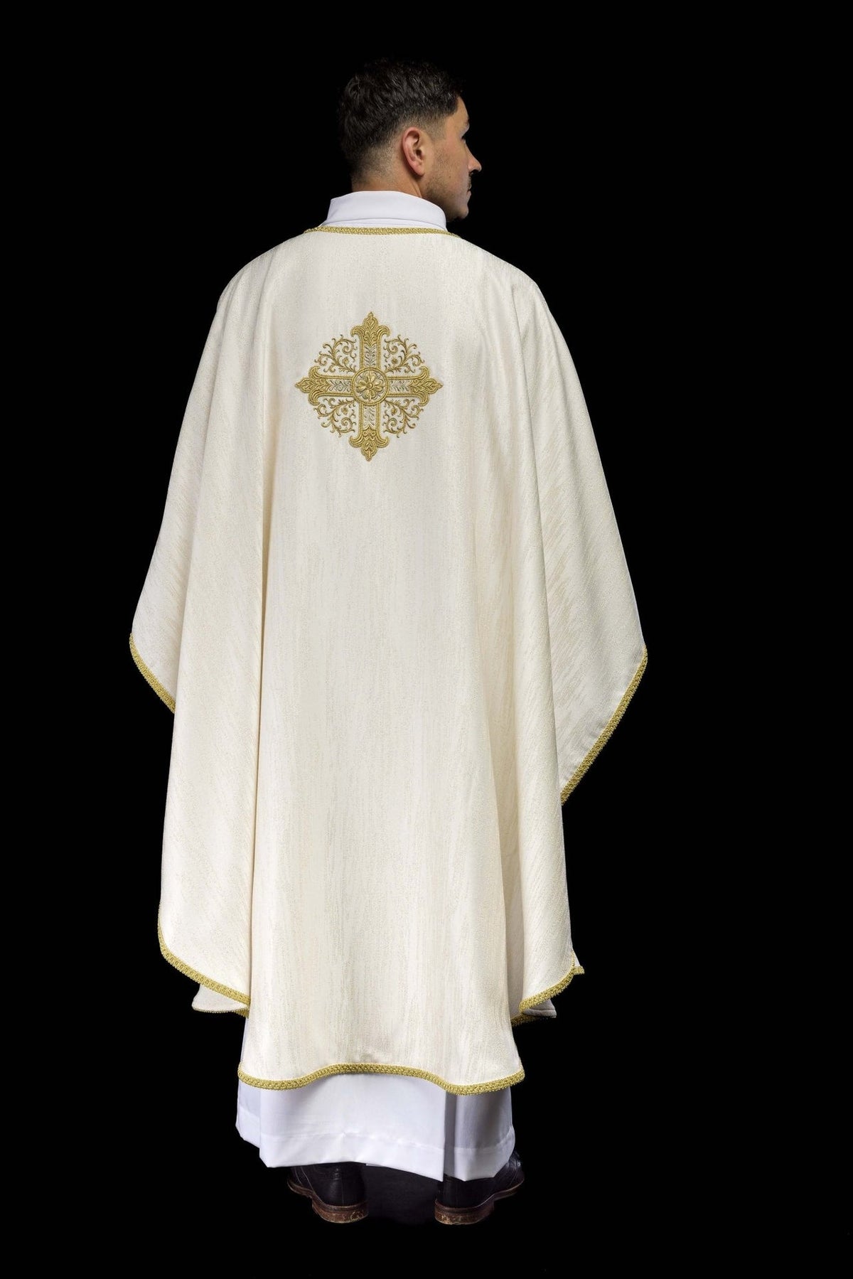Ecru chasuble full back view with gold trim and cross embroidery