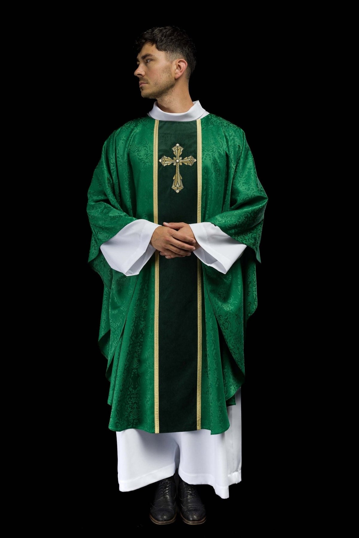 Green chasuble angled front view with jacquard fabric and cross embroidery