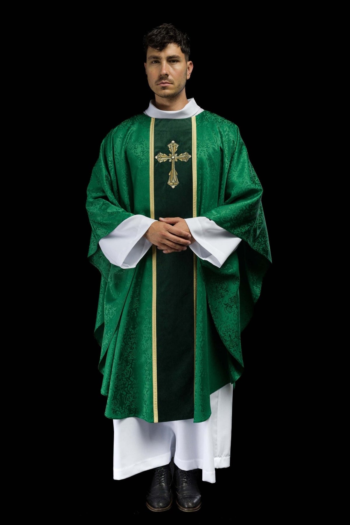 Green chasuble, full front view with gold orphrey and cross embroidery